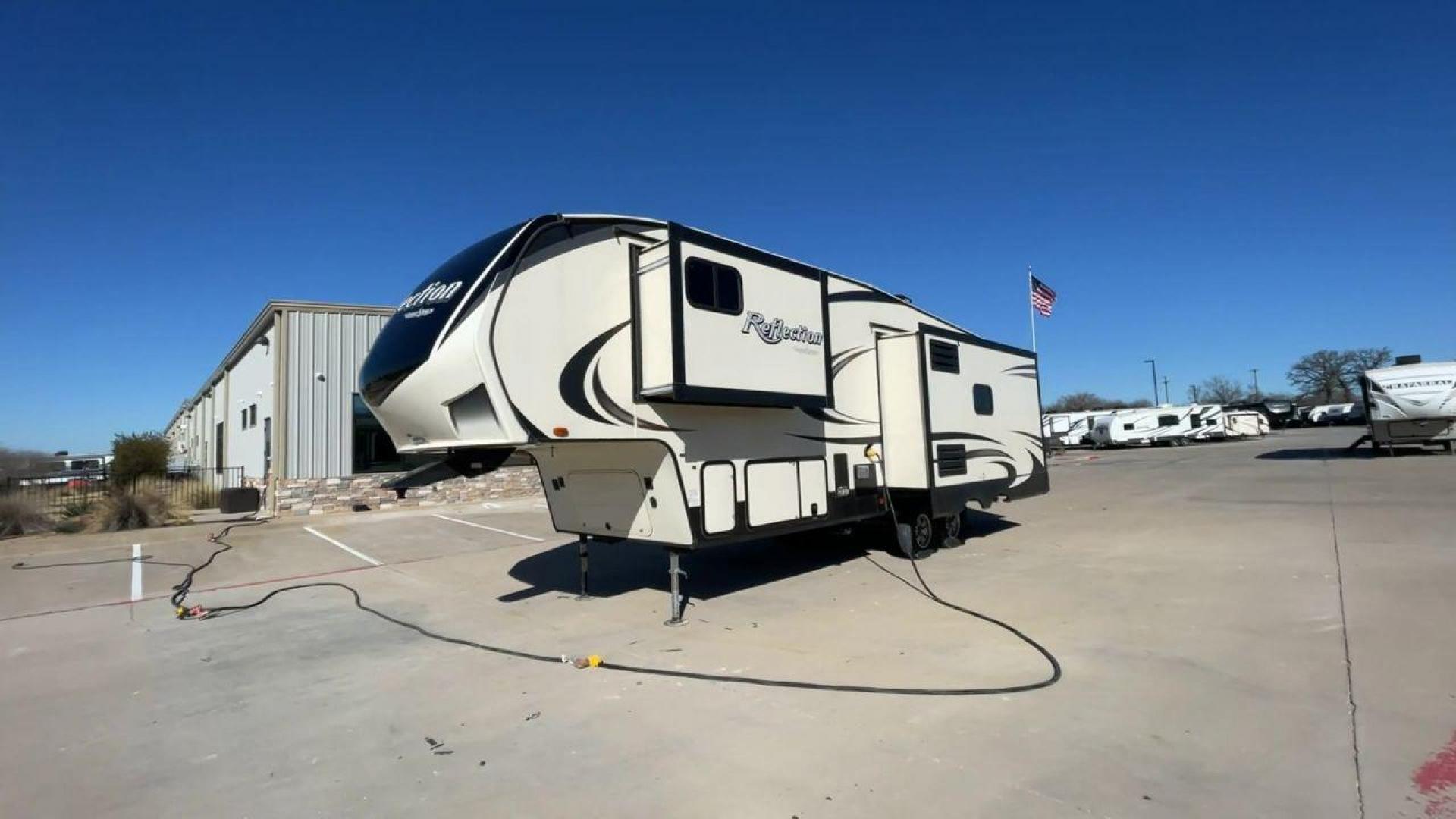 2019 GRAND DESIGN REFLECTION 303RLS (573FR3329K3) , Length: 32.42 ft| Dry Weight: 9,265 lbs. | Gross Weight: 11,995 lbs. | Slides: 3 transmission, located at 4319 N Main Street, Cleburne, TX, 76033, (817) 221-0660, 32.435829, -97.384178 - Experience the pinnacle of opulence and elegance with the 2019 Grand Design Reflection 303RLS, a fifth-wheel trailer that sets new benchmarks for luxurious RV living. This model boasts a generous 33-foot length, offering a roomy and thoughtfully crafted interior that creates the perfect atmosphere f - Photo#5