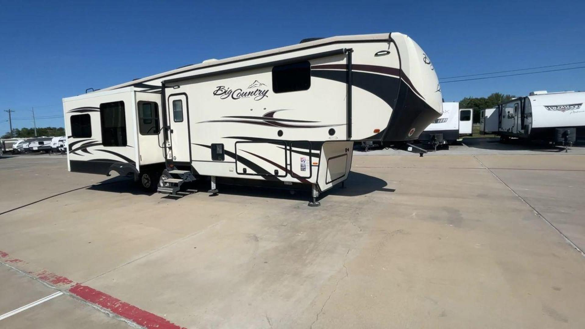 2019 TAN HEARTLAND BIG COUNTRY 3560SS (5SFBG4120KE) , Length: 40.58 ft. | Dry Weight: 13,420 lbs. | Gross Weight: 16,000 lbs. | Slides: 3 transmission, located at 4319 N Main Street, Cleburne, TX, 76033, (817) 221-0660, 32.435829, -97.384178 - Prepare yourself and your family for your next adventure in this 2019 Big Country 3560SS! This fifth wheel measures just over 40' in length. It is a dual axle, aluminum wheel setup with a dry weight of 13,420 lbs. and a carrying capacity of 2,532 lbs. This fifth wheel has three slides. The fro - Photo#3