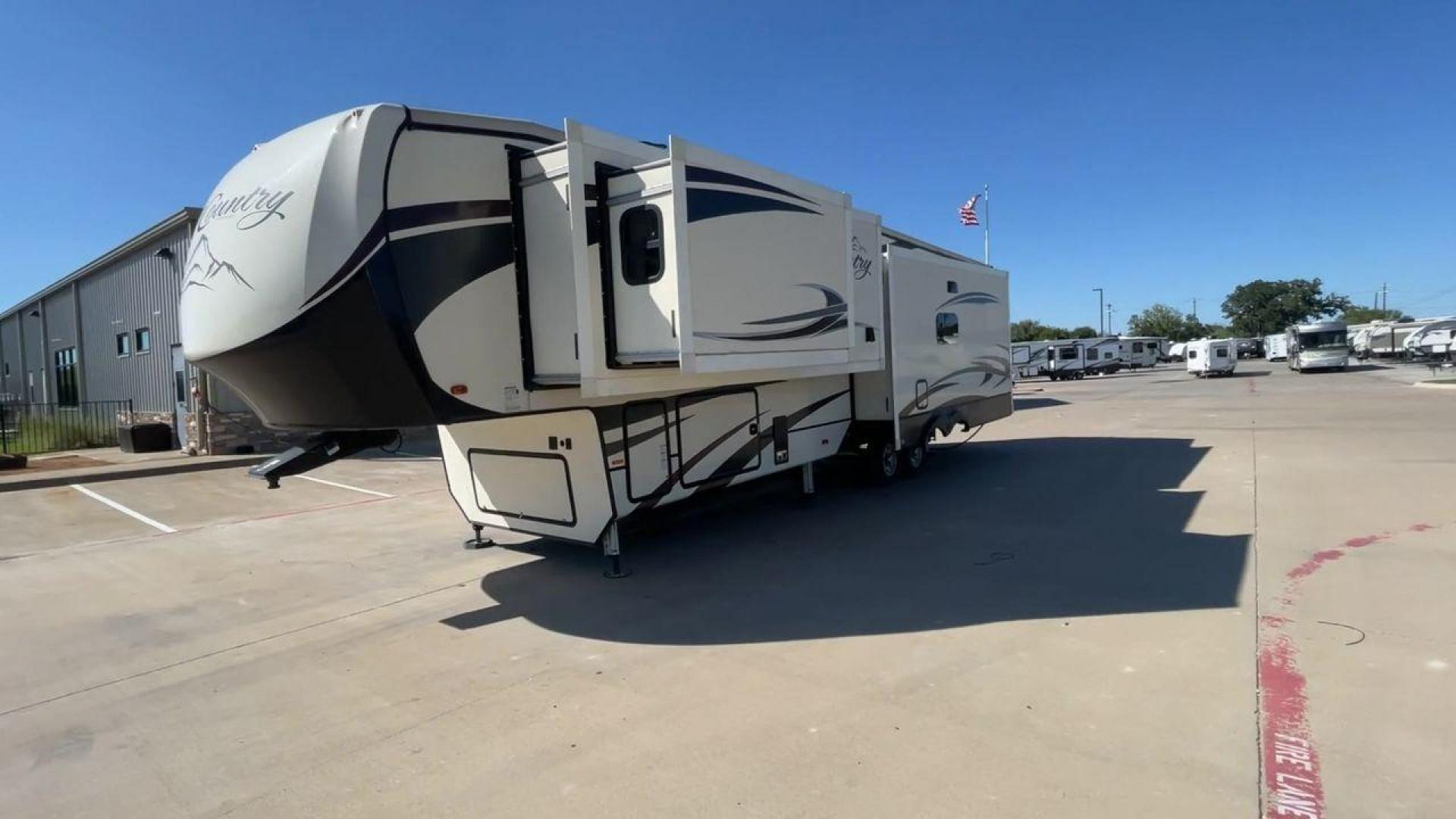 2019 TAN HEARTLAND BIG COUNTRY 3560SS (5SFBG4120KE) , Length: 40.58 ft. | Dry Weight: 13,420 lbs. | Gross Weight: 16,000 lbs. | Slides: 3 transmission, located at 4319 N Main Street, Cleburne, TX, 76033, (817) 221-0660, 32.435829, -97.384178 - Prepare yourself and your family for your next adventure in this 2019 Big Country 3560SS! This fifth wheel measures just over 40' in length. It is a dual axle, aluminum wheel setup with a dry weight of 13,420 lbs. and a carrying capacity of 2,532 lbs. This fifth wheel has three slides. The fro - Photo#5