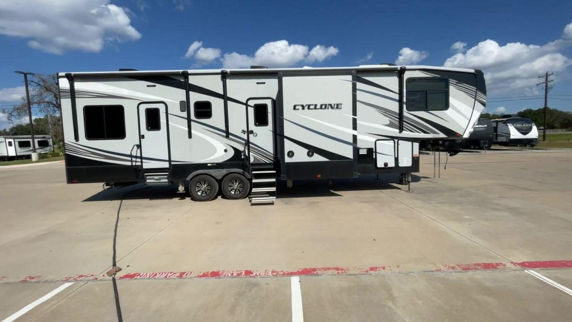 2019 HEARTLAND CYCLONE 3611 (5SFCG3923KE) , Length: 38.8 ft. | Dry Weight: 15,305 lbs. | Gross Weight: 17,000 lbs. | Slides: 3 transmission, located at 4319 N Main Street, Cleburne, TX, 76033, (817) 221-0660, 32.435829, -97.384178 - Photo#2