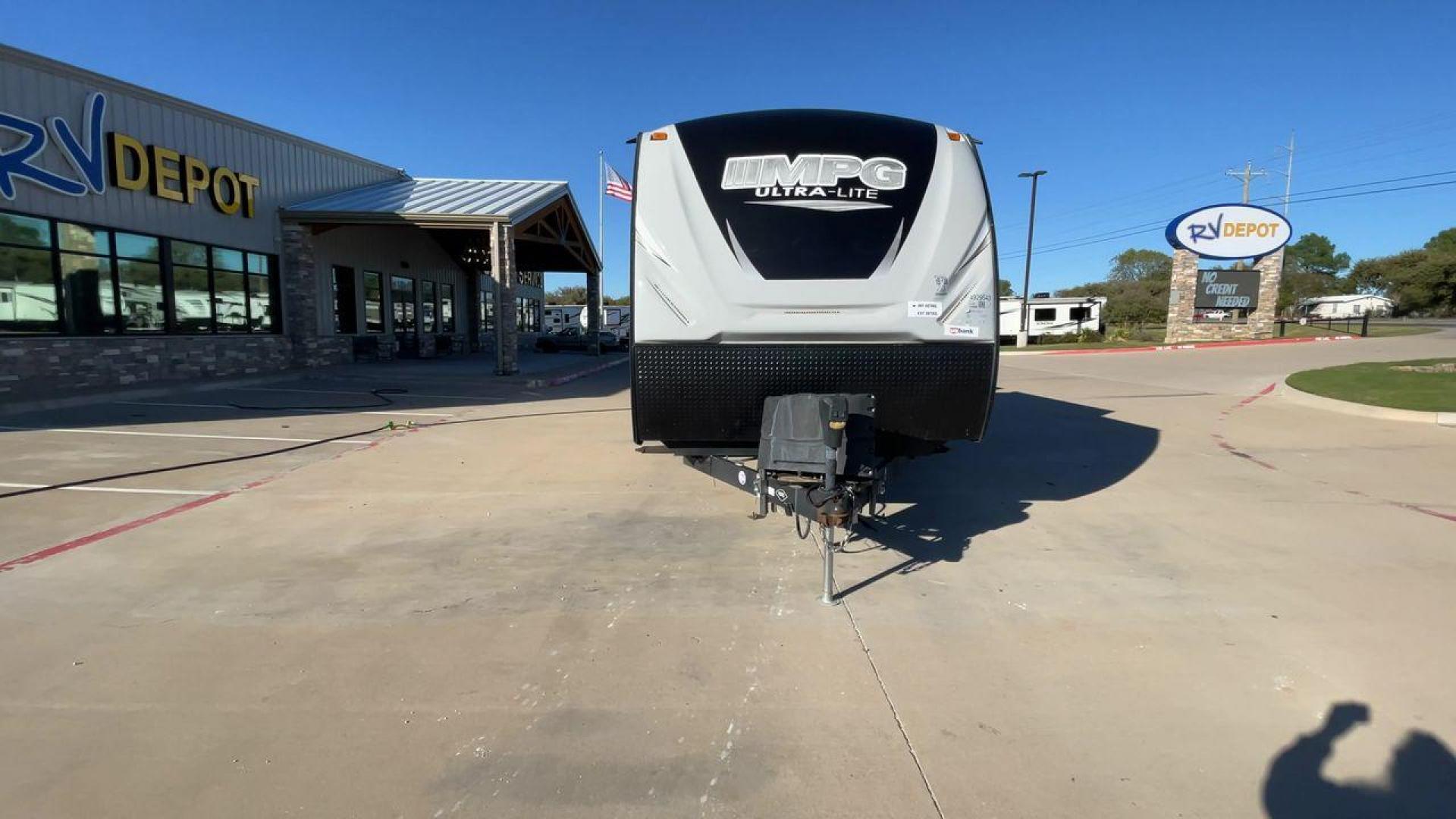 2019 HEARTLAND MPG 3100BH (5RXHB362XK2) , Length: 36.42 ft. | Dry Weight: 6,930 lbs. | Gross Weight: 9,655 lbs. | Slides: 2 transmission, located at 4319 N Main Street, Cleburne, TX, 76033, (817) 221-0660, 32.435829, -97.384178 - The 2019 Heartland MPG 3100BH travel trailer features an impressive exterior with a sleek, modern design. It measures 36.42 feet in length, providing ample space while maintaining a manageable profile for towing. The trailer includes two slideouts, which enhance the living space when parked. The tra - Photo#4