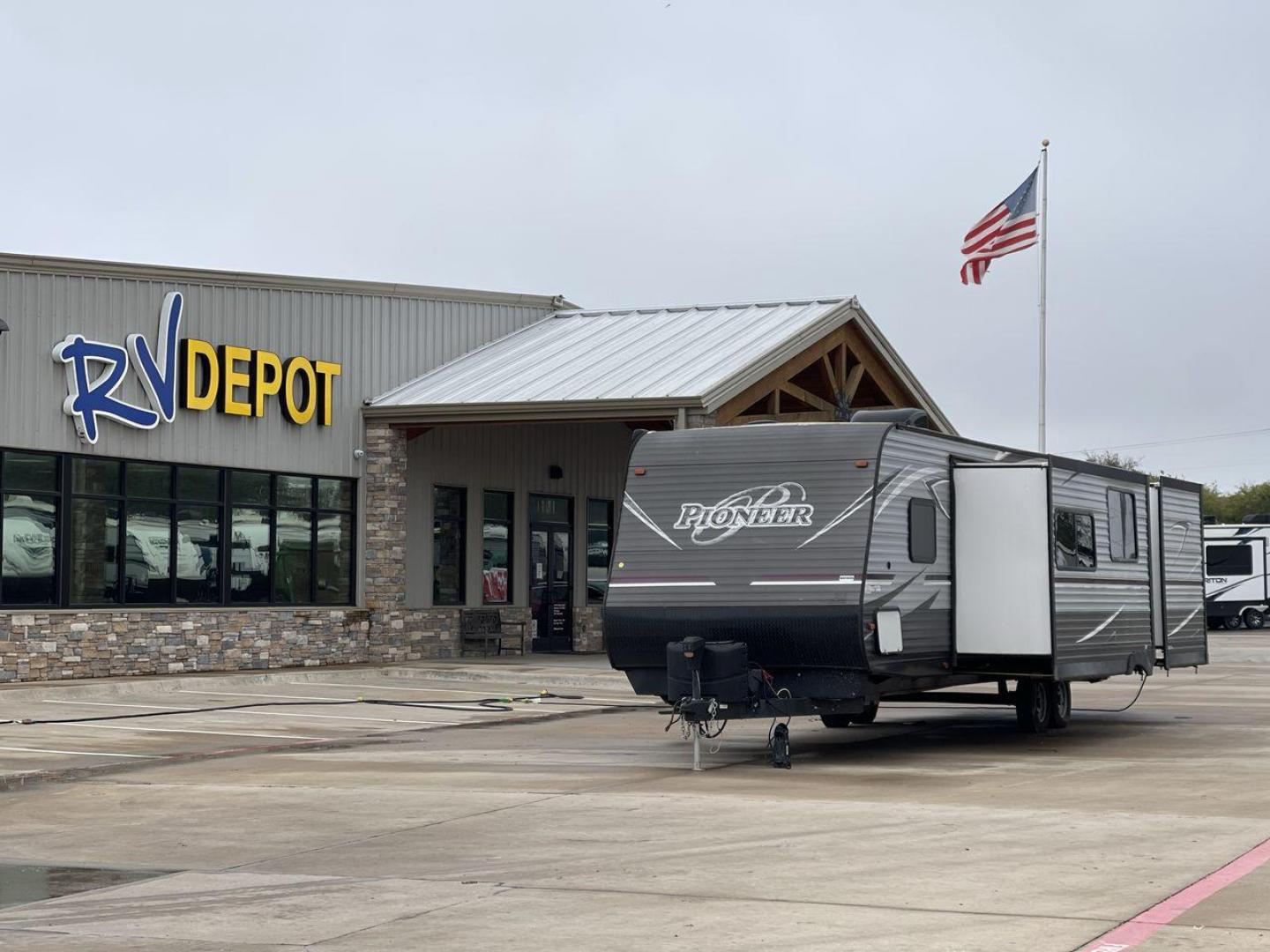 2019 GRAY HEARTLAND PIONEER DS320 (5SFPB3723KE) , Length: 37 ft. | Dry Weight: 7,612 lbs. | Slides: 2 transmission, located at 4319 N Main Street, Cleburne, TX, 76033, (817) 221-0660, 32.435829, -97.384178 - The 2019 Heartland Pioneer DS320 is designed to provide comfort and practicality for adventurers. Measuring 37 feet in length, this RV offers ample space for families or groups. Its dry weight of 7,612 lbs makes it towable by a variety of vehicles while maintaining stability on the road. This unit f - Photo#0