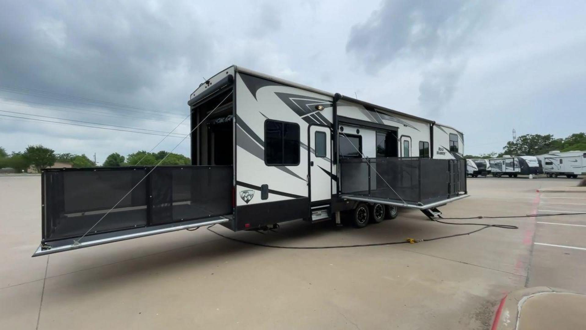 2019 HEARTLAND ROAD WARRIOR 427RW (5SFCG4435KE) , Length: 44.08 ft. | Dry Weight: 16,400 lbs. | Gross Weight: 20,000 lbs. | Slides: 2 transmission, located at 4319 N Main Street, Cleburne, TX, 76033, (817) 221-0660, 32.435829, -97.384178 - The 2019 Heartland Road Warrior 427RW fifth wheel toy hauler is ready for your next journey. The length of this amazing RV is 44.08 feet, its dry weight is 16,400 lbs and its gross weight is 20,000 lbs. This makes it stable and long-lasting on the road. This RV is strong and stylish, with two slides - Photo#1