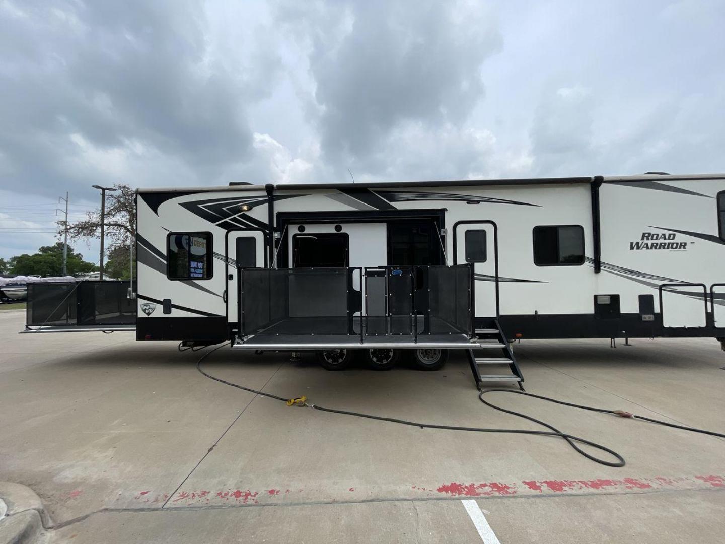 2019 HEARTLAND ROAD WARRIOR 427RW (5SFCG4435KE) , Length: 44.08 ft. | Dry Weight: 16,400 lbs. | Gross Weight: 20,000 lbs. | Slides: 2 transmission, located at 4319 N Main Street, Cleburne, TX, 76033, (817) 221-0660, 32.435829, -97.384178 - The 2019 Heartland Road Warrior 427RW fifth wheel toy hauler is ready for your next journey. The length of this amazing RV is 44.08 feet, its dry weight is 16,400 lbs and its gross weight is 20,000 lbs. This makes it stable and long-lasting on the road. This RV is strong and stylish, with two slides - Photo#24