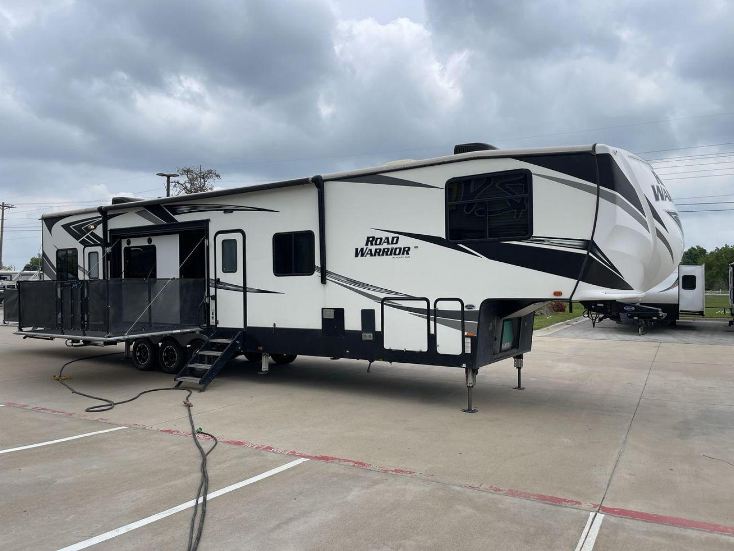 2019 HEARTLAND ROAD WARRIOR 427RW (5SFCG4435KE) , Length: 44.08 ft. | Dry Weight: 16,400 lbs. | Gross Weight: 20,000 lbs. | Slides: 2 transmission, located at 4319 N Main Street, Cleburne, TX, 76033, (817) 221-0660, 32.435829, -97.384178 - The 2019 Heartland Road Warrior 427RW fifth wheel toy hauler is ready for your next journey. The length of this amazing RV is 44.08 feet, its dry weight is 16,400 lbs and its gross weight is 20,000 lbs. This makes it stable and long-lasting on the road. This RV is strong and stylish, with two slides - Photo#28