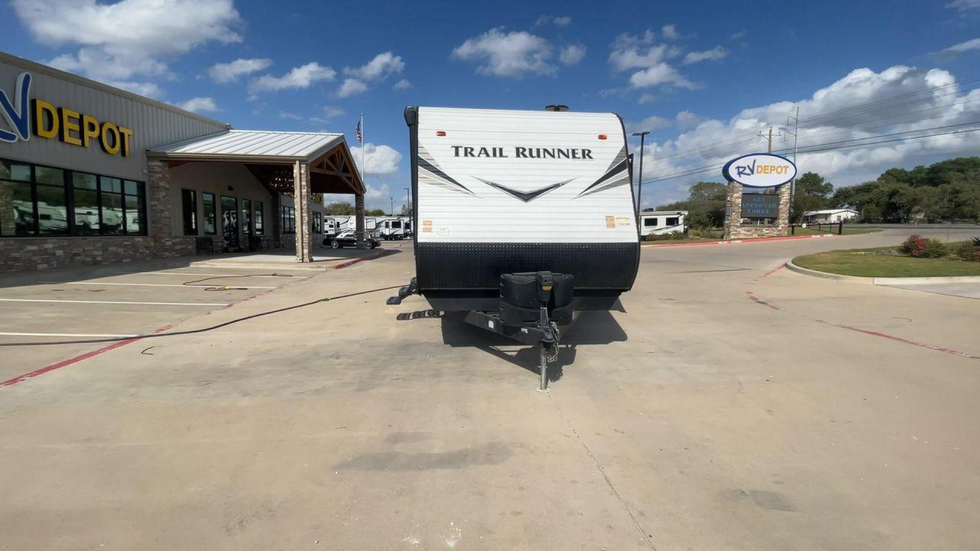 2019 HEARTLAND TRAIL RUNNER 325ODK (5SFEB3624KE) , Length: 36.3 ft. | Dry Weight: 7,724 lbs. | Slides: 2 transmission, located at 4319 N Main Street, Cleburne, TX, 76033, (817) 221-0660, 32.435829, -97.384178 - The 2019 Heartland Trail Runner 325ODK is a spacious travel trailer built for family comfort, with a unique bunkhouse, roomy living area, and outdoor kitchen. This model is perfect for families who enjoy extended trips with the convenience of home-like amenities. The dimensions of this unit are 36.3 - Photo#4