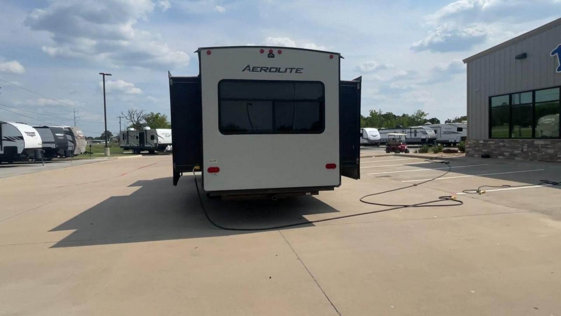 2019 KEYSTONE AEROLITE 330RL (4YDT33022KP) , Length: 38 ft. | Dry Weight: 8,778 lbs. | Slides: 3 transmission, located at 4319 N Main Street, Cleburne, TX, 76033, (817) 221-0660, 32.435829, -97.384178 - The 2019 Keystone Aerolite 330RL is a luxurious travel trailer that offers both comfort and functionality. At 38 feet in length and a dry weight of 8,778 lbs., this unit features three slide-outs that expand the living space, providing a roomy and comfortable interior. The living area is designed wi - Photo#8