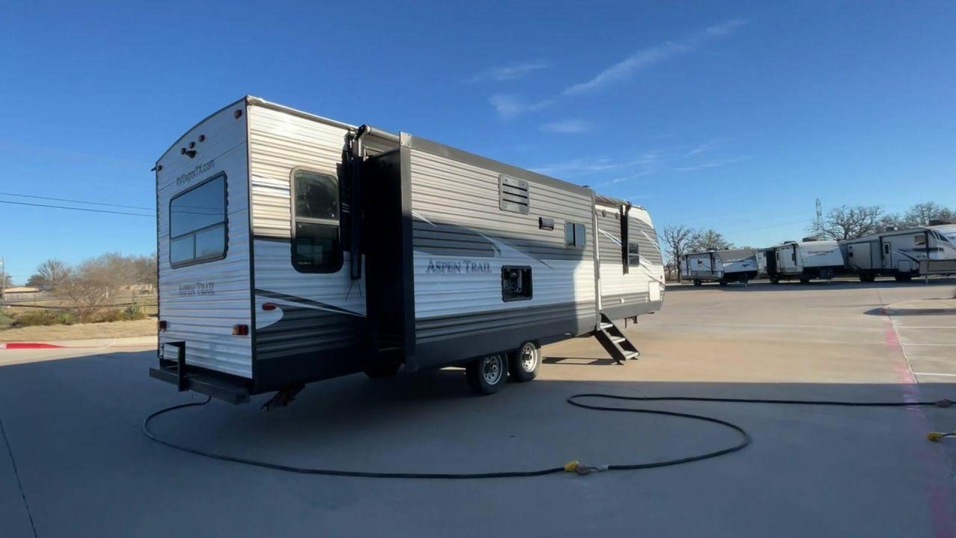 2019 WHITE KEYSTONE ASPEN TRAIL 3070RLS (4YDT30723K8) , Length: 34.92 ft. | Dry Weight: 7,333 lbs. | Slides: 2 transmission, located at 4319 N Main Street, Cleburne, TX, 76033, (817) 221-0660, 32.435829, -97.384178 - The 2019 Aspen Trail 3070RLS by Keystone is a meticulously designed travel trailer that combines style and functionality. With dimensions measuring 34.92 ft in length, 8 ft in width, 11.17 ft in height, and an interior height of 6.83 ft, this unit ensures a spacious and comfortable living experienc - Photo#1