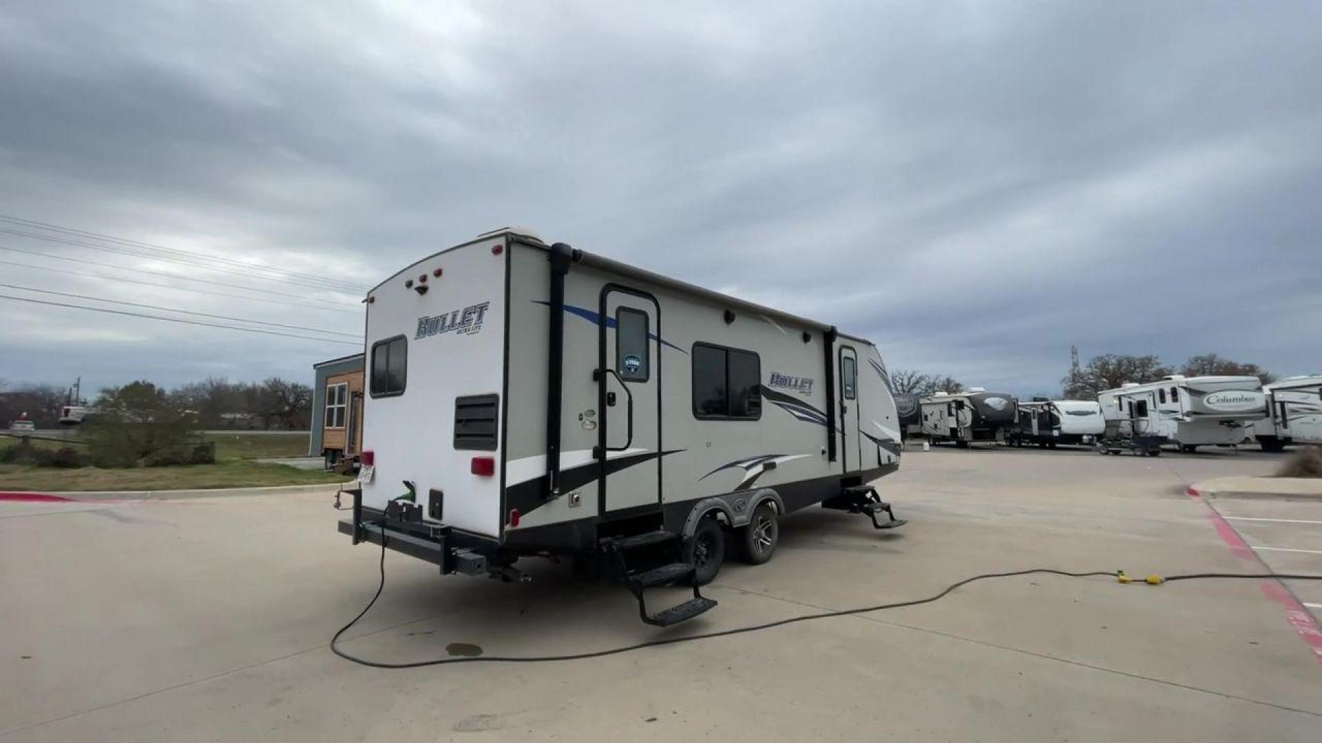 2019 KEYSTONE BULLET 248RKS (4YDT24821KT) , located at 4319 N Main Street, Cleburne, TX, 76033, (817) 221-0660, 32.435829, -97.384178 - Discover extra features that contribute to making this RV an ideal investment. (1) Both the front and rear of the trailer have entry doors, providing convenient access and potentially enhancing ventilation options. (2) The 2019 Keystone Bullet 248RKS is significantly lighter than many similar-s - Photo#1