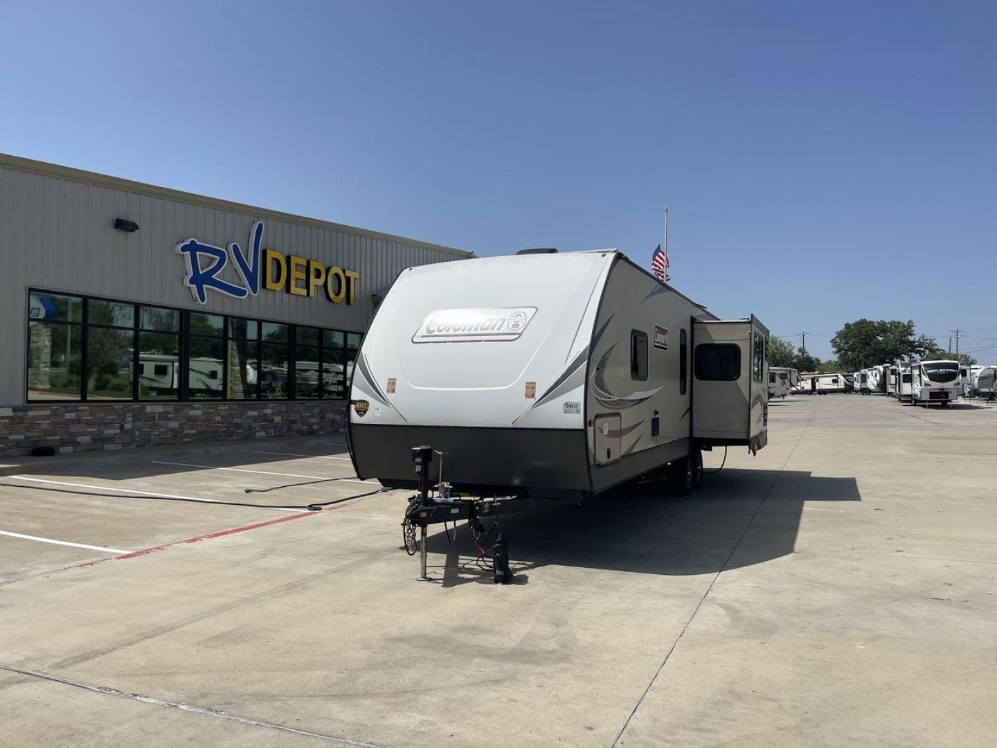 2019 KEYSTONE COLEMAN 2825RK (4YDT28226KM) , Length: 32.92 ft. | Dry Weight: 6,522 lbs. | Slides: 1 transmission, located at 4319 N Main Street, Cleburne, TX, 76033, (817) 221-0660, 32.435829, -97.384178 - The 2019 Keystone Coleman 2825RK is intended for comfort and convenience. It measures 32.92 feet long and weighs 6,522 pounds dry. It has a single slide-out that greatly increases the inside room. The outside, streamlined with a clean, neutral color palette highlighted with red and black graphics, p - Photo#0