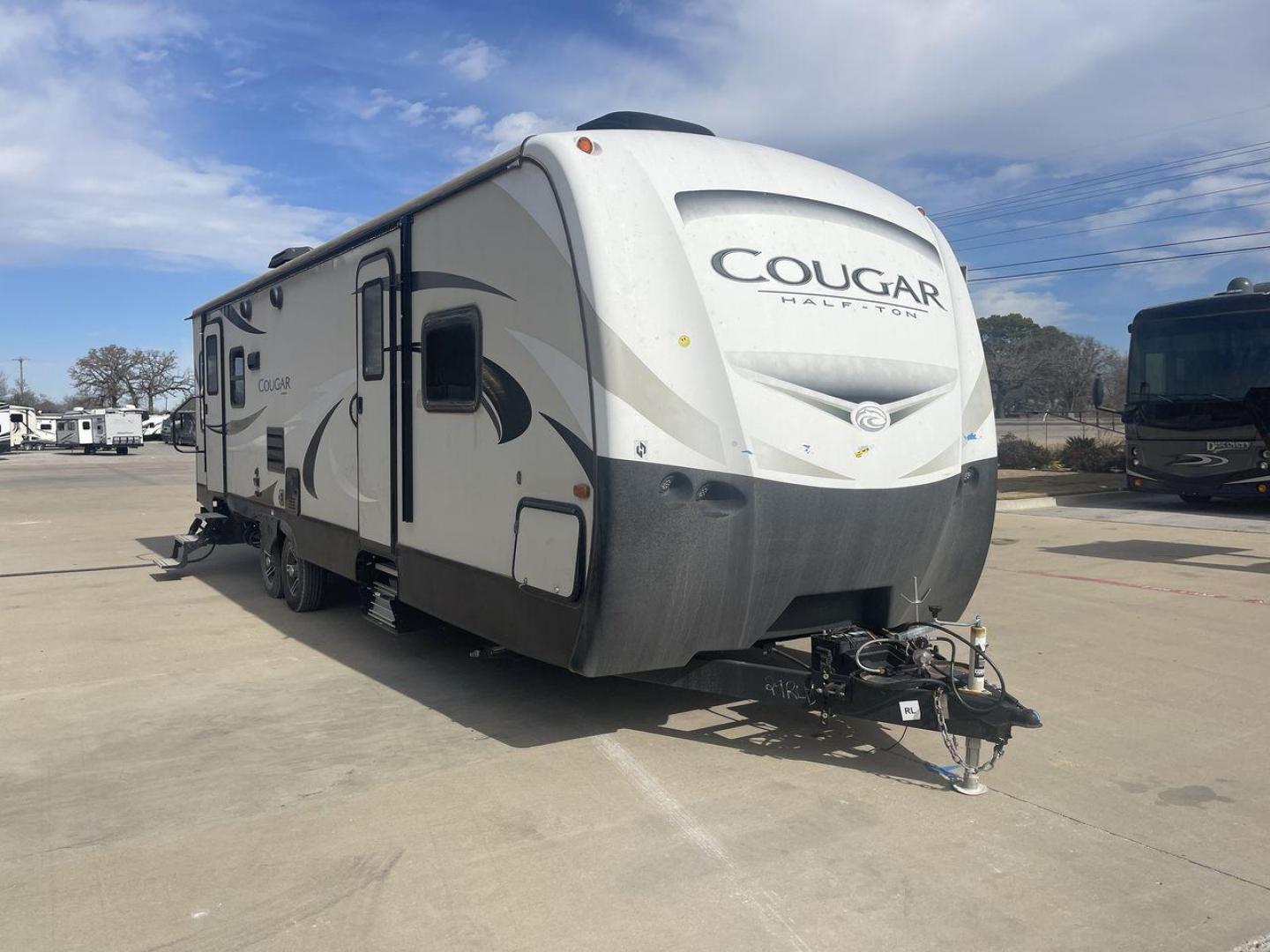 2019 TAN KEYSTONE COUGAR 29RLD (4YDT29R22JV) , Length: 34 ft. | Dry Weight: 7,380 lbs. | Gross Weight: 9,560 lbs. | Slides: 2 transmission, located at 4319 N Main Street, Cleburne, TX, 76033, (817) 221-0660, 32.435829, -97.384178 - The 2019 Keystone Cougar 29RLD is a dual-axle aluminum wheel set-up measuring exactly 34 ft. in length. It has a dry weight of 7,380 lbs. and a GVWR of 9,560 lbs. Its exterior is a base color of tan with black and white accents. It comes with automatic heating and cooling rated at 35,000 and 15,000 - Photo#21