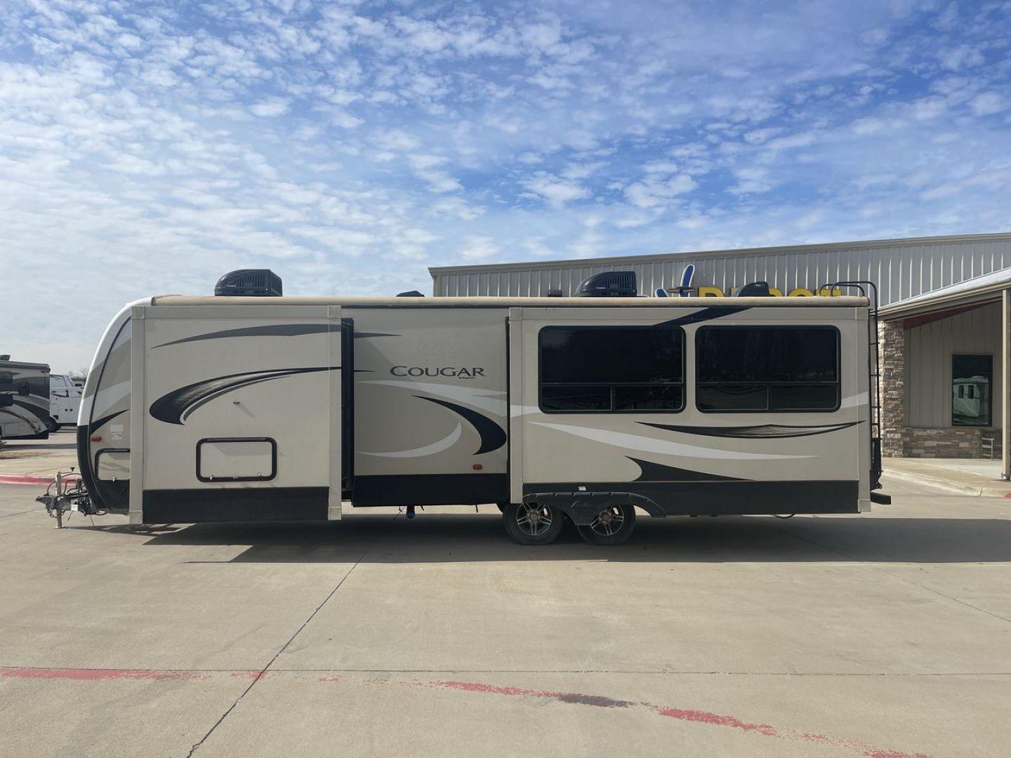 2019 TAN KEYSTONE COUGAR 29RLD (4YDT29R22JV) , Length: 34 ft. | Dry Weight: 7,380 lbs. | Gross Weight: 9,560 lbs. | Slides: 2 transmission, located at 4319 N Main Street, Cleburne, TX, 76033, (817) 221-0660, 32.435829, -97.384178 - The 2019 Keystone Cougar 29RLD is a dual-axle aluminum wheel set-up measuring exactly 34 ft. in length. It has a dry weight of 7,380 lbs. and a GVWR of 9,560 lbs. Its exterior is a base color of tan with black and white accents. It comes with automatic heating and cooling rated at 35,000 and 15,000 - Photo#22