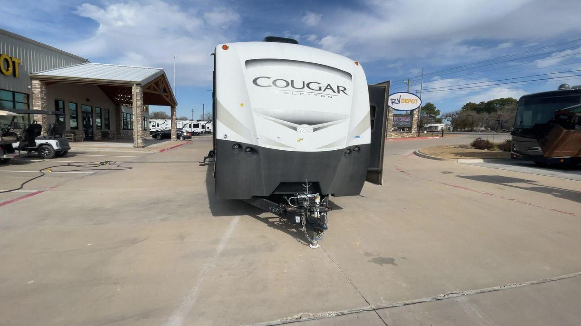 2019 TAN KEYSTONE COUGAR 29RLD (4YDT29R22JV) , Length: 34 ft. | Dry Weight: 7,380 lbs. | Gross Weight: 9,560 lbs. | Slides: 2 transmission, located at 4319 N Main Street, Cleburne, TX, 76033, (817) 221-0660, 32.435829, -97.384178 - The 2019 Keystone Cougar 29RLD is a dual-axle aluminum wheel set-up measuring exactly 34 ft. in length. It has a dry weight of 7,380 lbs. and a GVWR of 9,560 lbs. Its exterior is a base color of tan with black and white accents. It comes with automatic heating and cooling rated at 35,000 and 15,000 - Photo#4