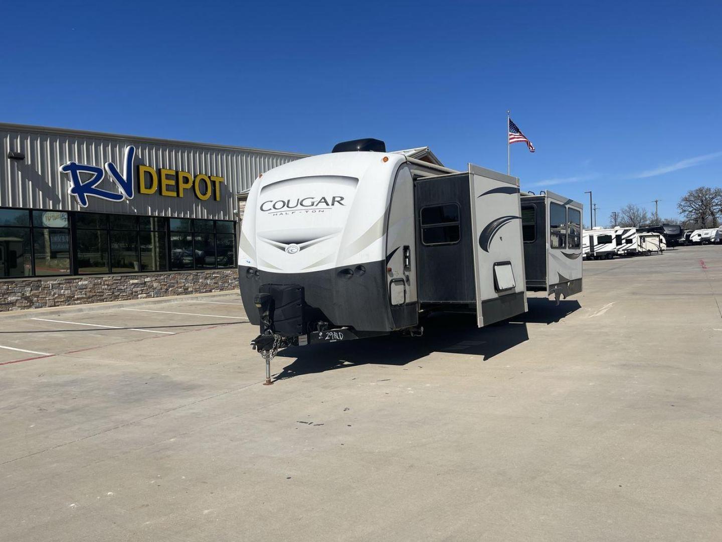 2019 TAN KEYSTONE COUGAR 29RLD (4YDT29R29JV) , Length: 34 ft. | Dry Weight: 7,380 lbs. | Gross Weight: 9,560 lbs. | Slides: 2 transmission, located at 4319 N Main Street, Cleburne, TX, 76033, (817) 221-0660, 32.435829, -97.384178 - Photo#0