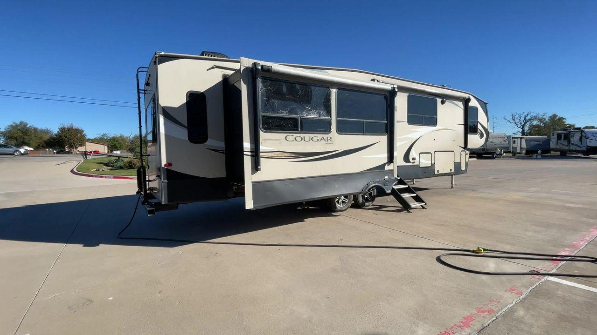 2019 KEYSTONE COUGAR 368MBI (4YDF3682XK2) , Length: 40.08 ft. | Dry Weight: 11,575 lbs. | Gross Weight: 13,980 lbs.| Slides: 4 transmission, located at 4319 N Main Street, Cleburne, TX, 76033, (817) 221-0660, 32.435829, -97.384178 - Photo#1