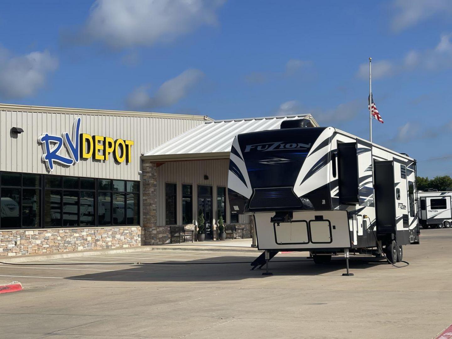 2019 KEYSTONE FUZION 373 (4YDF37322KF) , Length: 39 ft. | Dry Weight: 13,920 lbs. | Gross Weight: 17,000 lbs. | Slides: 3 transmission, located at 4319 N Main Street, Cleburne, TX, 76033, (817) 221-0660, 32.435829, -97.384178 - The 2019 Keystone Fuzion 373 is an impressive 39-foot toy hauler designed for adventurous travelers. With a dry weight of 13,920 lbs and a gross weight of 17,000 lbs, this RV combines rugged capabilities with luxurious living spaces. Featuring three slides, the Fuzion 373 offers a spacious interior - Photo#0