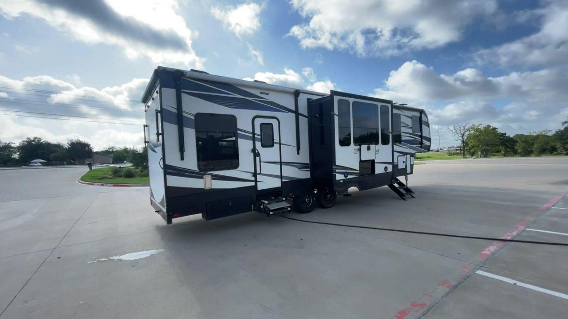 2019 KEYSTONE FUZION 373 (4YDF37322KF) , Length: 39 ft. | Dry Weight: 13,920 lbs. | Gross Weight: 17,000 lbs. | Slides: 3 transmission, located at 4319 N Main Street, Cleburne, TX, 76033, (817) 221-0660, 32.435829, -97.384178 - The 2019 Keystone Fuzion 373 is an impressive 39-foot toy hauler designed for adventurous travelers. With a dry weight of 13,920 lbs and a gross weight of 17,000 lbs, this RV combines rugged capabilities with luxurious living spaces. Featuring three slides, the Fuzion 373 offers a spacious interior - Photo#1