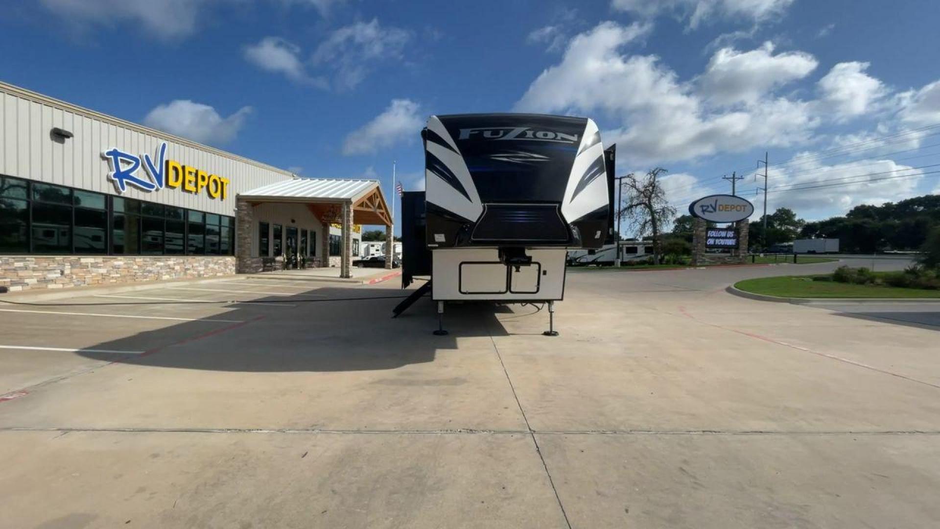 2019 KEYSTONE FUZION 373 (4YDF37322KF) , Length: 39 ft. | Dry Weight: 13,920 lbs. | Gross Weight: 17,000 lbs. | Slides: 3 transmission, located at 4319 N Main Street, Cleburne, TX, 76033, (817) 221-0660, 32.435829, -97.384178 - The 2019 Keystone Fuzion 373 is an impressive 39-foot toy hauler designed for adventurous travelers. With a dry weight of 13,920 lbs and a gross weight of 17,000 lbs, this RV combines rugged capabilities with luxurious living spaces. Featuring three slides, the Fuzion 373 offers a spacious interior - Photo#4