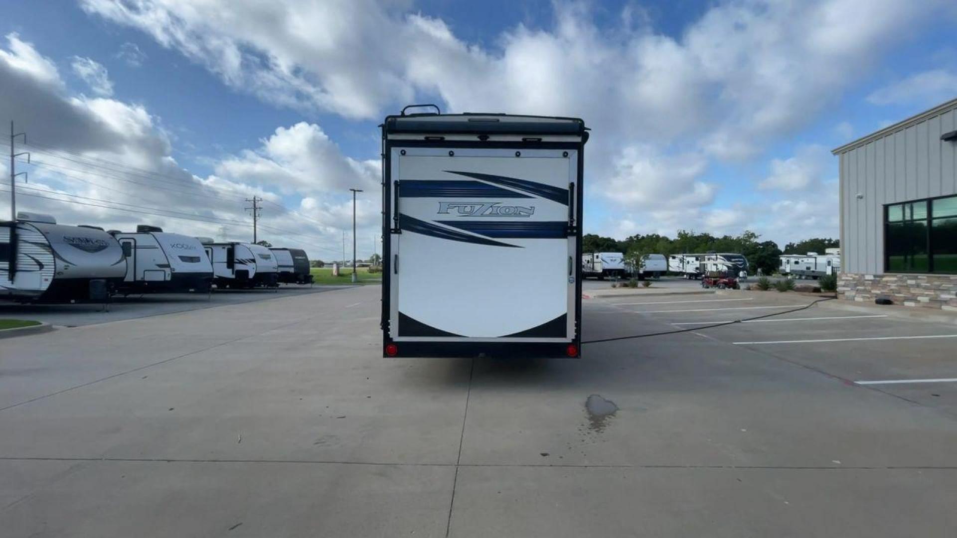 2019 KEYSTONE FUZION 373 (4YDF37322KF) , Length: 39 ft. | Dry Weight: 13,920 lbs. | Gross Weight: 17,000 lbs. | Slides: 3 transmission, located at 4319 N Main Street, Cleburne, TX, 76033, (817) 221-0660, 32.435829, -97.384178 - The 2019 Keystone Fuzion 373 is an impressive 39-foot toy hauler designed for adventurous travelers. With a dry weight of 13,920 lbs and a gross weight of 17,000 lbs, this RV combines rugged capabilities with luxurious living spaces. Featuring three slides, the Fuzion 373 offers a spacious interior - Photo#8