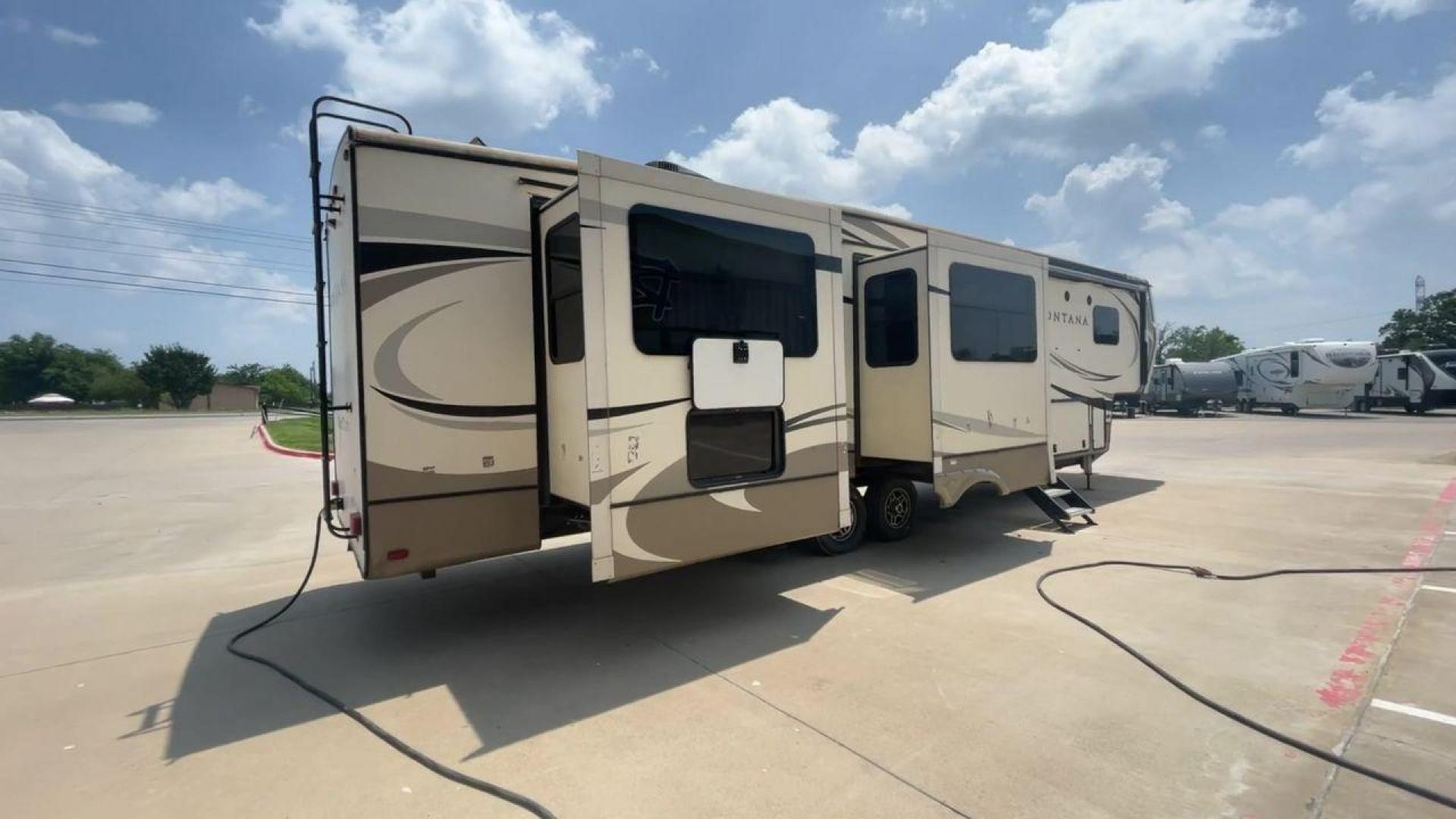 2019 KEYSTONE MONTANA 3701LK (4YDF3702XK4) , Length: 40.5 ft. | Dry Weight: 13,095 lbs. | Gross Weight: 16,400 lbs. | Slides: 4 transmission, located at 4319 N Main Street, Cleburne, TX, 76033, (817) 221-0660, 32.435829, -97.384178 - Looking to camp in the lap of luxury and comfort? Go for this 2019 Keystone Montana 3701LK! This fifth wheel measures 40.5 ft. in length and 13.42 ft. in height. Not only is it spacious, but it also has plenty of headroom for tall campers! It also has a dry weight of 13,095 lbs. with a 3,305-poun - Photo#1