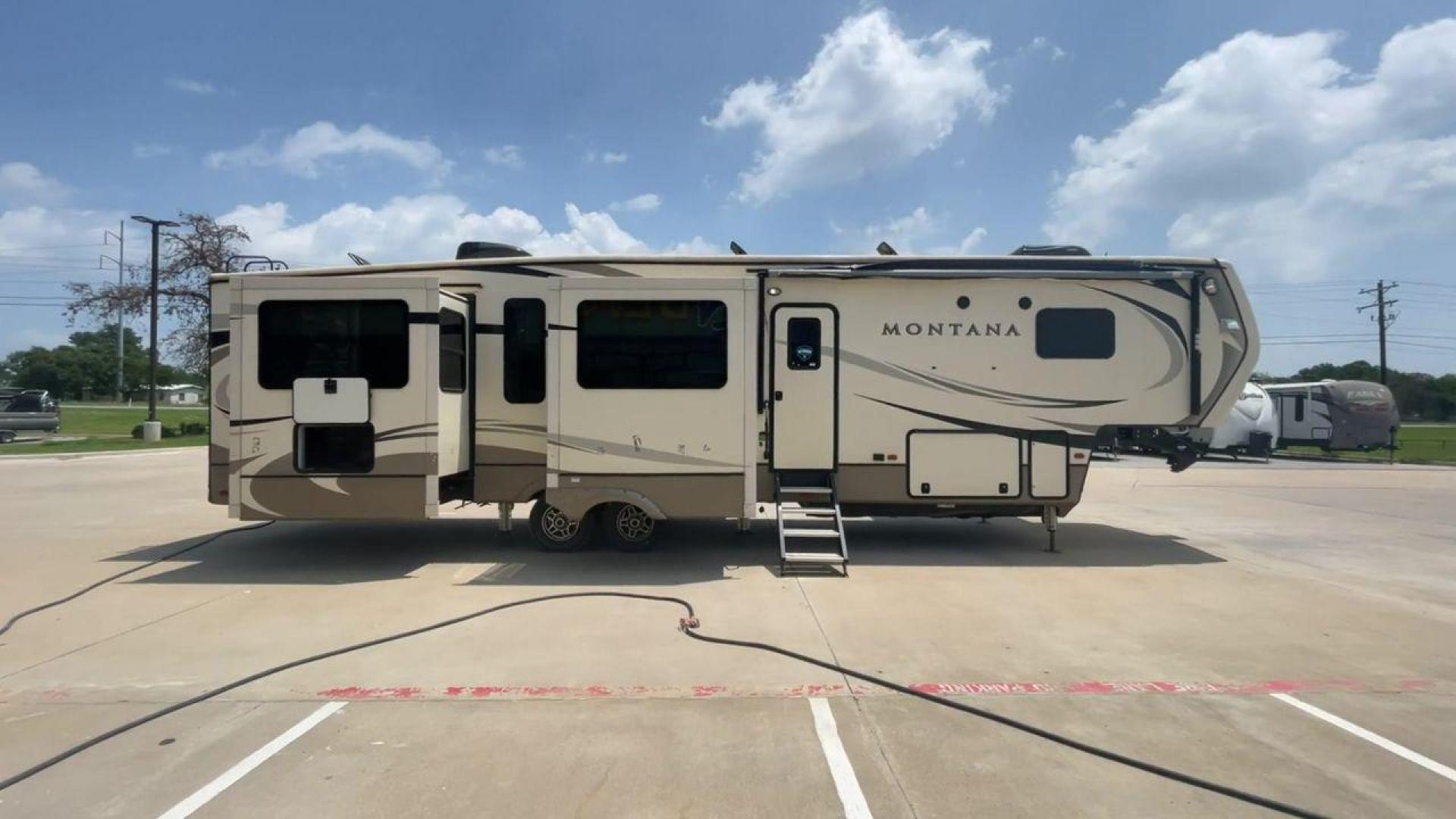 2019 KEYSTONE MONTANA 3701LK (4YDF3702XK4) , Length: 40.5 ft. | Dry Weight: 13,095 lbs. | Gross Weight: 16,400 lbs. | Slides: 4 transmission, located at 4319 N Main Street, Cleburne, TX, 76033, (817) 221-0660, 32.435829, -97.384178 - Looking to camp in the lap of luxury and comfort? Go for this 2019 Keystone Montana 3701LK! This fifth wheel measures 40.5 ft. in length and 13.42 ft. in height. Not only is it spacious, but it also has plenty of headroom for tall campers! It also has a dry weight of 13,095 lbs. with a 3,305-poun - Photo#2