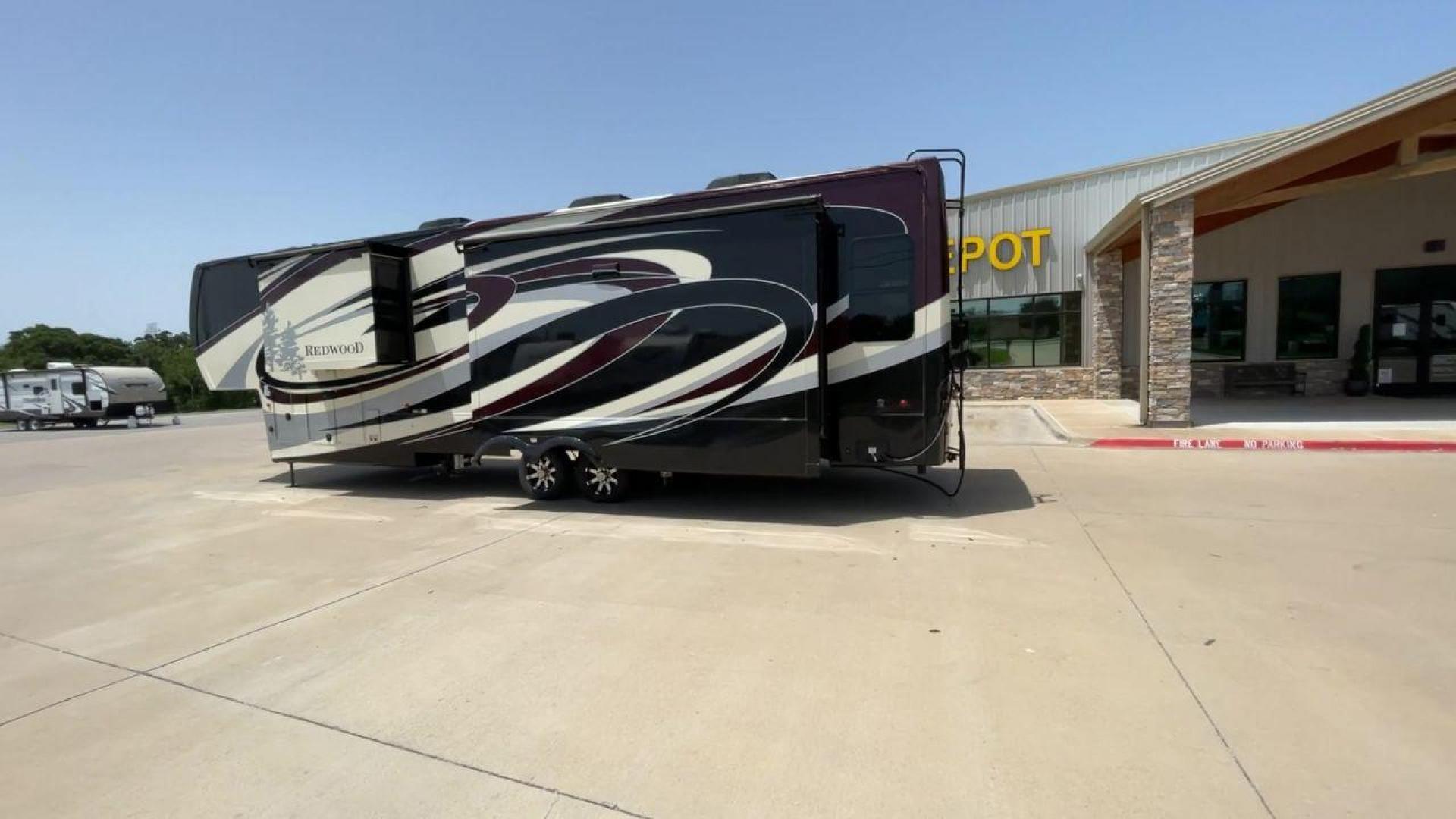 2019 KEYSTONE REDWOOD 3901WB (4YDF39023K9) , Length: 40.17 ft. | Dry Weight: 14,312 lbs. | Slides: 3 transmission, located at 4319 N Main Street, Cleburne, TX, 76033, (817) 221-0660, 32.435829, -97.384178 - The 2019 Keystone Redwood 3901WB is a high-end fifth-wheel RV that blends luxury living with home-like comfort. It's perfect for long trips or full-time living. Its outside has a high-gloss paint job in black and white colors, with the Redwood tree graphics that make it stand out. This RV is over 40 - Photo#6