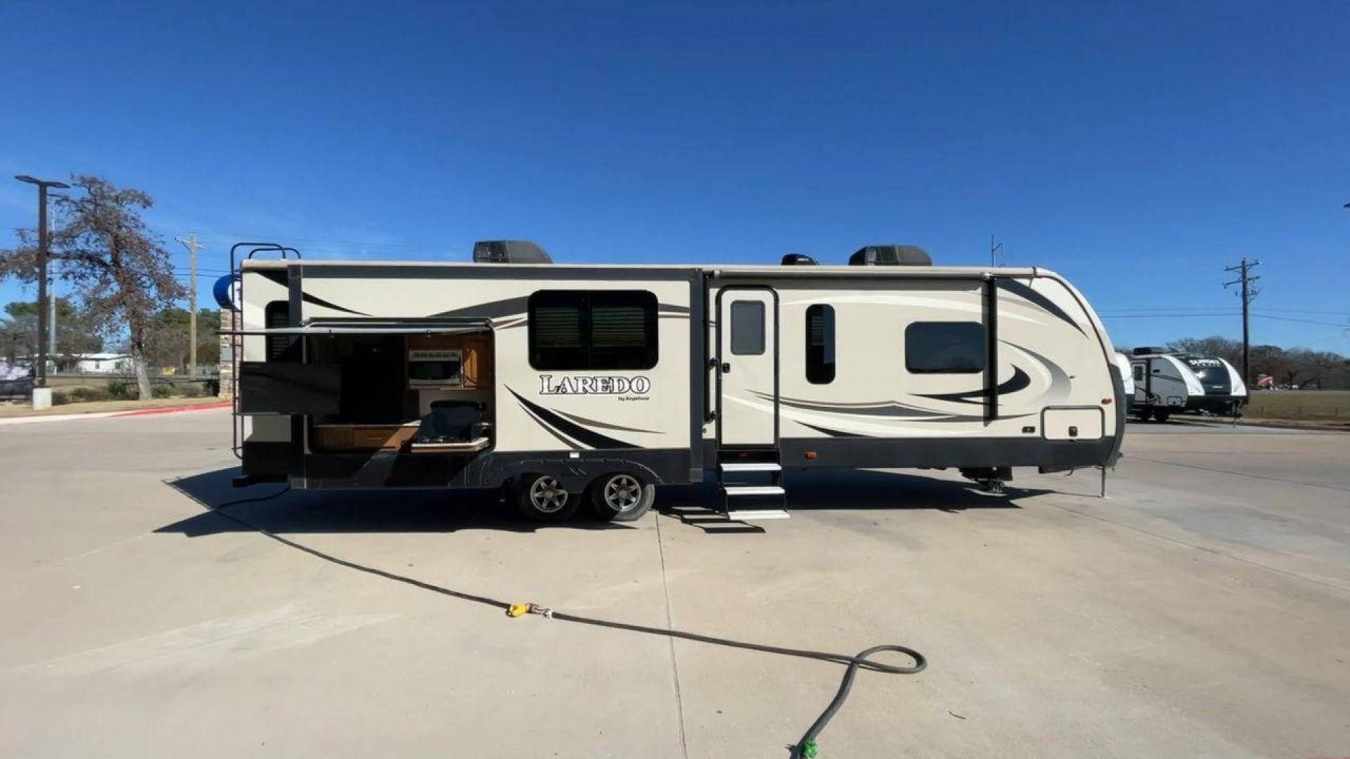 2019 KEYSTONE RV LAREDO 330RL (4YDT33027KB) , located at 4319 N Main Street, Cleburne, TX, 76033, (817) 221-0660, 32.435829, -97.384178 - Photo#2