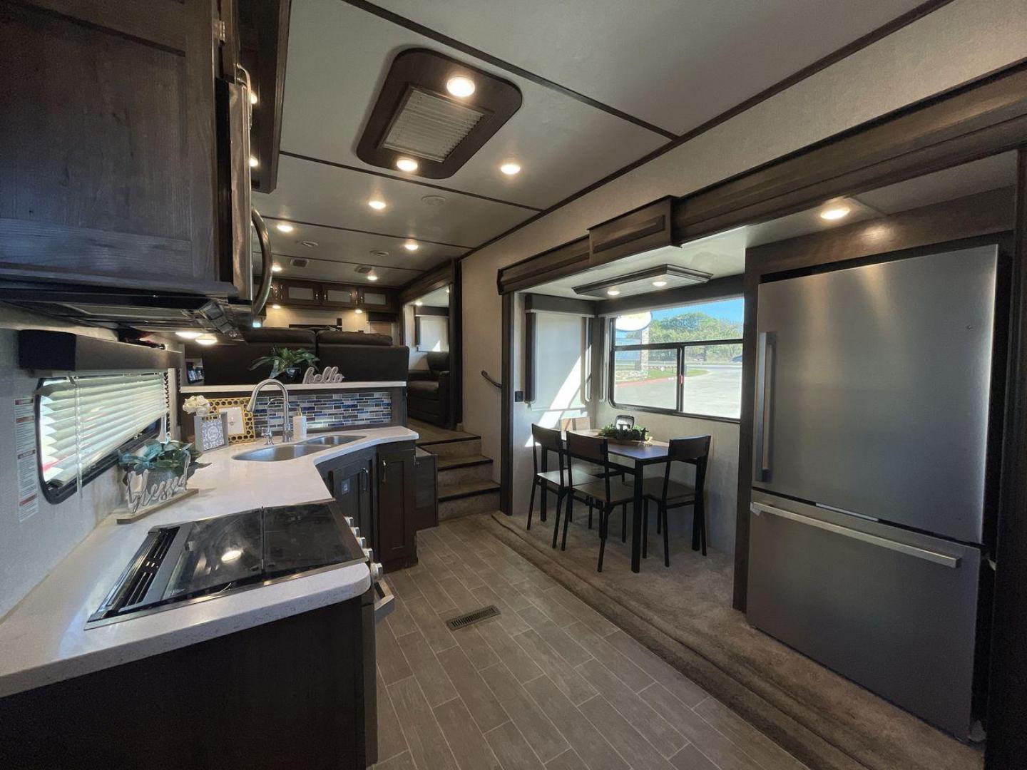 2019 KEYSTONE RV MONTANA 373RD (4YDF37323KA) , Length: 41.33 ft. | Dry Weight: 12,800 lbs. | Gross Weight: 16,000 lbs. | Slides: 4 transmission, located at 4319 N Main Street, Cleburne, TX, 76033, (817) 221-0660, 32.435829, -97.384178 - The 2019 Keystone RV Montana 373RD is a luxurious and spacious fifth wheel designed to provide the utmost comfort, convenience, and style for your next adventure. Right up front, this trailer is a painted cap with LED lights. The massive power awning on its side has a LED strip and rolls out with a - Photo#9