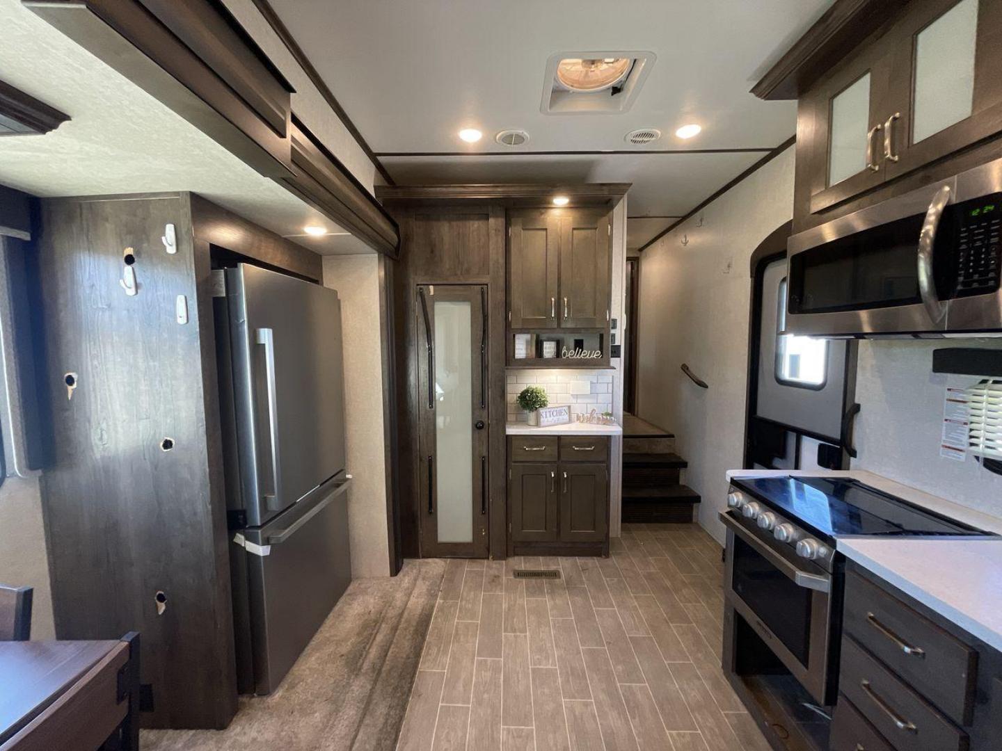 2019 KEYSTONE RV MONTANA 373RD (4YDF37323KA) , Length: 41.33 ft. | Dry Weight: 12,800 lbs. | Gross Weight: 16,000 lbs. | Slides: 4 transmission, located at 4319 N Main Street, Cleburne, TX, 76033, (817) 221-0660, 32.435829, -97.384178 - The 2019 Keystone RV Montana 373RD is a luxurious and spacious fifth wheel designed to provide the utmost comfort, convenience, and style for your next adventure. Right up front, this trailer is a painted cap with LED lights. The massive power awning on its side has a LED strip and rolls out with a - Photo#12