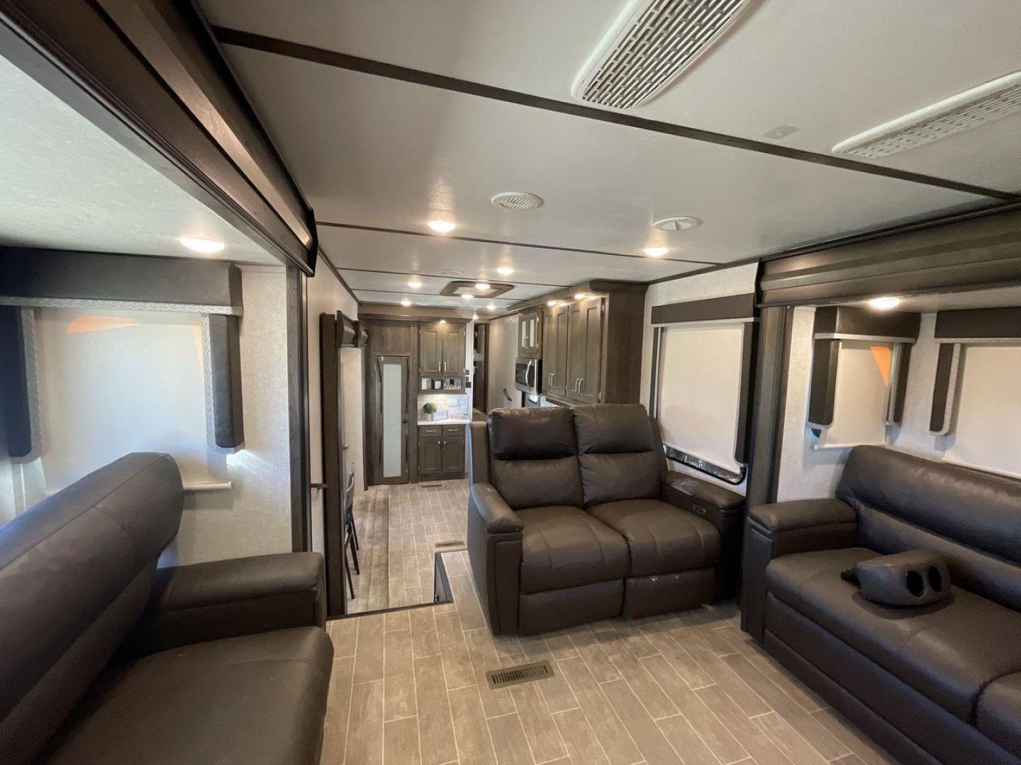 2019 KEYSTONE RV MONTANA 373RD (4YDF37323KA) , Length: 41.33 ft. | Dry Weight: 12,800 lbs. | Gross Weight: 16,000 lbs. | Slides: 4 transmission, located at 4319 N Main Street, Cleburne, TX, 76033, (817) 221-0660, 32.435829, -97.384178 - The 2019 Keystone RV Montana 373RD is a luxurious and spacious fifth wheel designed to provide the utmost comfort, convenience, and style for your next adventure. Right up front, this trailer is a painted cap with LED lights. The massive power awning on its side has a LED strip and rolls out with a - Photo#12