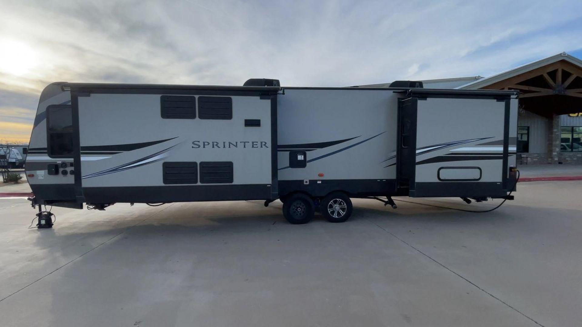 2019 KEYSTONE SPRINTER 330KBS (4YDT33021K1) , Length: 37.75 ft. | Dry Weight: 9,100 lbs. | Gross Weight: 11,500 lbs. | Slides: 3 transmission, located at 4319 N Main Street, Cleburne, TX, 76033, (817) 221-0660, 32.435829, -97.384178 - The 2019 Keystone Sprinter 330KBS travel trailer is a spacious and well-designed unit, measuring 37.75 feet in length. The exterior is sleek and modern, featuring a gray and white color scheme accented by black and blue graphic lines. The trailer has three (3) slideouts, providing ample space for c - Photo#6