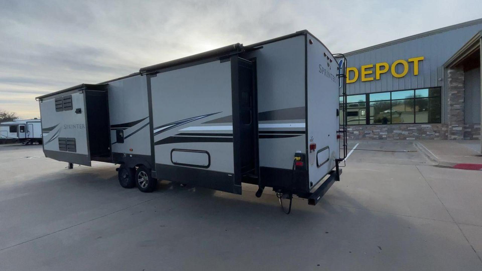 2019 KEYSTONE SPRINTER 330KBS (4YDT33021K1) , Length: 37.75 ft. | Dry Weight: 9,100 lbs. | Gross Weight: 11,500 lbs. | Slides: 3 transmission, located at 4319 N Main Street, Cleburne, TX, 76033, (817) 221-0660, 32.435829, -97.384178 - The 2019 Keystone Sprinter 330KBS travel trailer is a spacious and well-designed unit, measuring 37.75 feet in length. The exterior is sleek and modern, featuring a gray and white color scheme accented by black and blue graphic lines. The trailer has three (3) slideouts, providing ample space for c - Photo#7