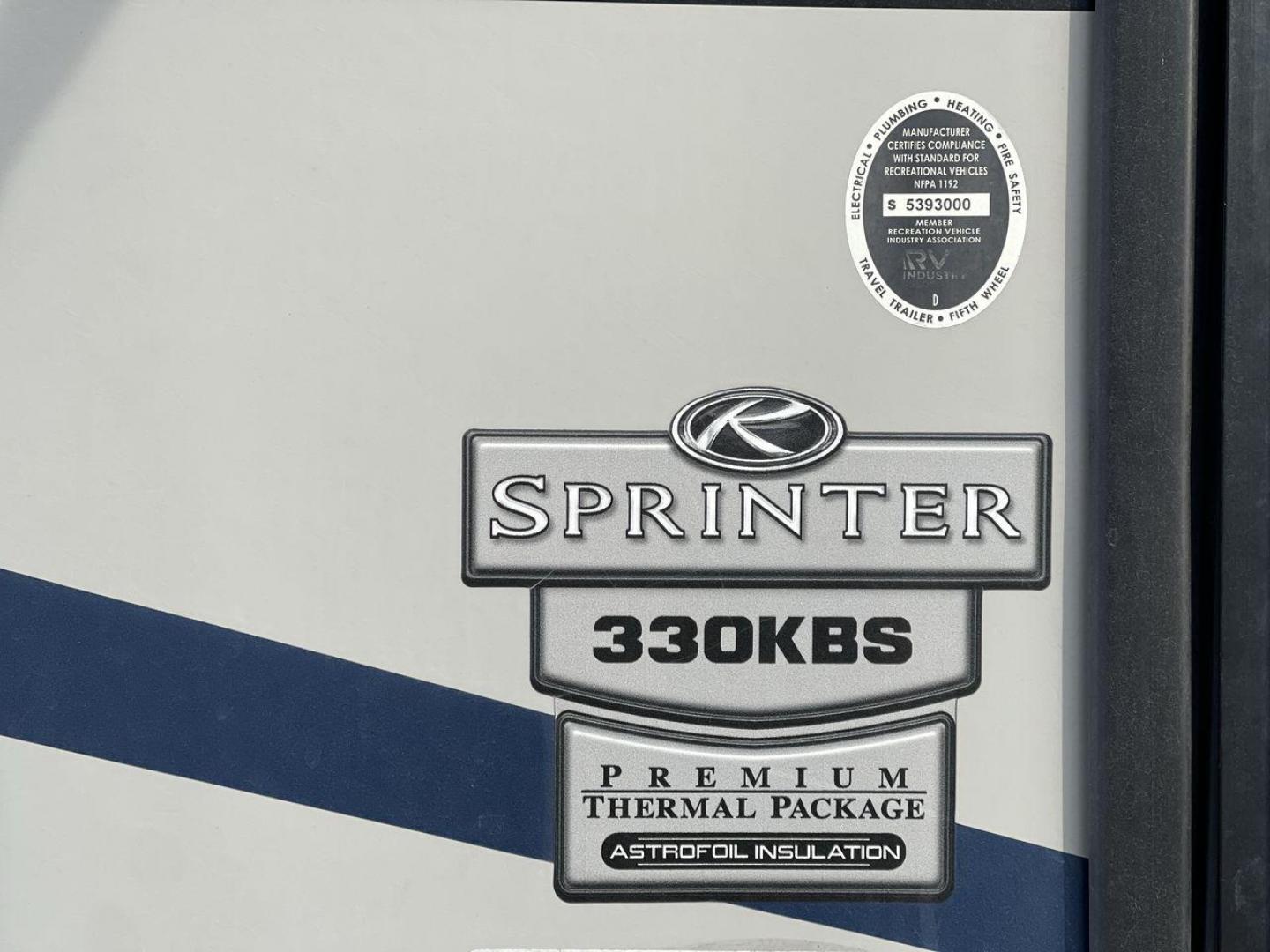 2019 KEYSTONE SPRINTER 330KBS (4YDT33021K1) , Length: 37.75 ft. | Dry Weight: 9,100 lbs. | Gross Weight: 11,500 lbs. | Slides: 3 transmission, located at 4319 N Main Street, Cleburne, TX, 76033, (817) 221-0660, 32.435829, -97.384178 - The 2019 Keystone Sprinter 330KBS travel trailer is a spacious and well-designed unit, measuring 37.75 feet in length. The exterior is sleek and modern, featuring a gray and white color scheme accented by black and blue graphic lines. The trailer has three (3) slideouts, providing ample space for c - Photo#22