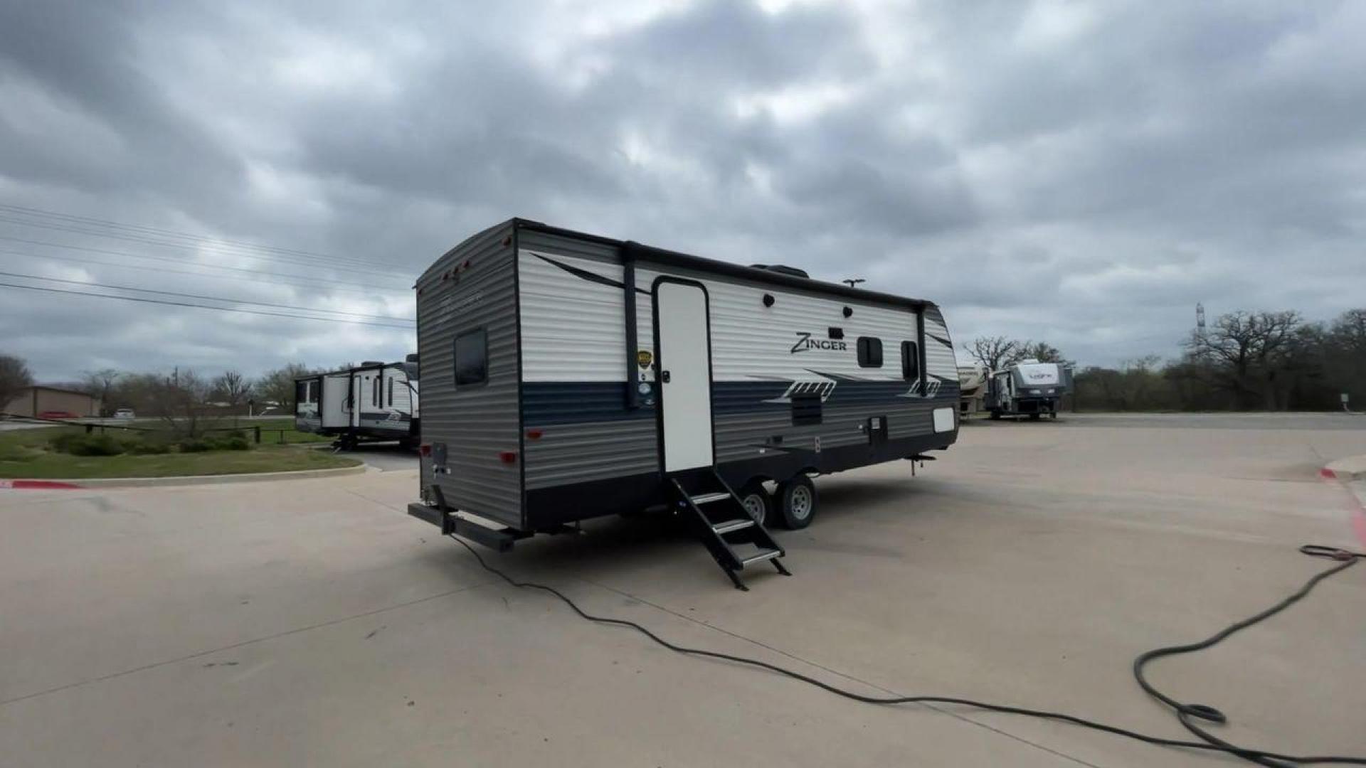 2019 KEYSTONE ZINGER 254RB (4YDT25426KS) , Length: 29.5 ft | Dry Weight: 6,042 lbs| Slides: 1 transmission, located at 4319 N Main Street, Cleburne, TX, 76033, (817) 221-0660, 32.435829, -97.384178 - Take a trip of comfort and excitement in the 2019 Keystone Zinger 254RB travel trailer, which was carefully made to change the way you use an RV. This type, which is 29.5 feet long, is the perfect mix of functionality and style. The Zinger 254RB is built to last with a strong metal body and fibergla - Photo#1