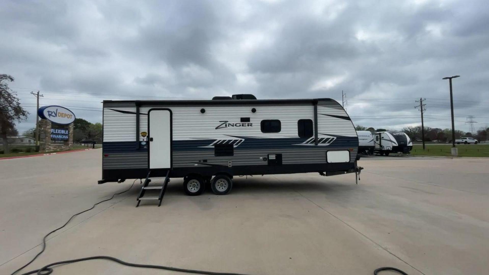 2019 KEYSTONE ZINGER 254RB (4YDT25426KS) , Length: 29.5 ft | Dry Weight: 6,042 lbs| Slides: 1 transmission, located at 4319 N Main Street, Cleburne, TX, 76033, (817) 221-0660, 32.435829, -97.384178 - Take a trip of comfort and excitement in the 2019 Keystone Zinger 254RB travel trailer, which was carefully made to change the way you use an RV. This type, which is 29.5 feet long, is the perfect mix of functionality and style. The Zinger 254RB is built to last with a strong metal body and fibergla - Photo#2