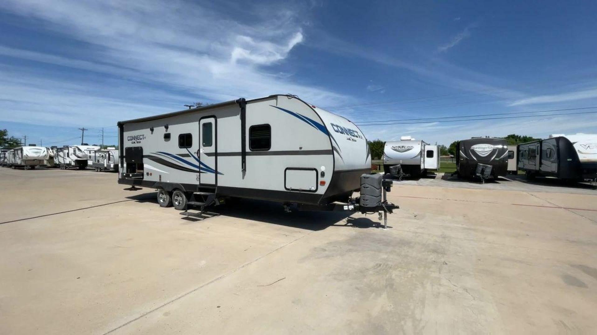 2019 KZ CONNECT 261BHSKE (4EZTL2627K7) , located at 4319 N Main Street, Cleburne, TX, 76033, (817) 221-0660, 32.435829, -97.384178 - Here are additional factors highlighting why owning this RV is a superb choice. (1) Its layout features a slide-out with a sofa and dinette that converts into a bed, providing ample space for relaxing and socializing. (2) It has a rear bunkhouse features two twin beds, ideal for children or gues - Photo#3