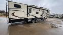 2019 KZ DURANGO GOLD 292BHT (4EZFD2925K6) , Length: 35 ft | Gross Weight: 11,500 lbs | Slides: 3 transmission, located at 4319 N Main Street, Cleburne, TX, 76033, (817) 221-0660, 32.435829, -97.384178 - At 35 ft. long, this 2019 KZ Durango 1500 292BHT fifth wheel RV showcases a striking two-tone cream and black color scheme accented with bold, swooping graphics in shades of gray and burgundy. The front cap features a sleek, aerodynamic design with the "Durango 1500" branding and mountain graphic. A - Photo#1