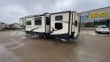 2019 KZ DURANGO GOLD 292BHT (4EZFD2925K6) , Length: 35 ft | Gross Weight: 11,500 lbs | Slides: 3 transmission, located at 4319 N Main Street, Cleburne, TX, 76033, (817) 221-0660, 32.435829, -97.384178 - At 35 ft. long, this 2019 KZ Durango 1500 292BHT fifth wheel RV showcases a striking two-tone cream and black color scheme accented with bold, swooping graphics in shades of gray and burgundy. The front cap features a sleek, aerodynamic design with the "Durango 1500" branding and mountain graphic. A - Photo#7