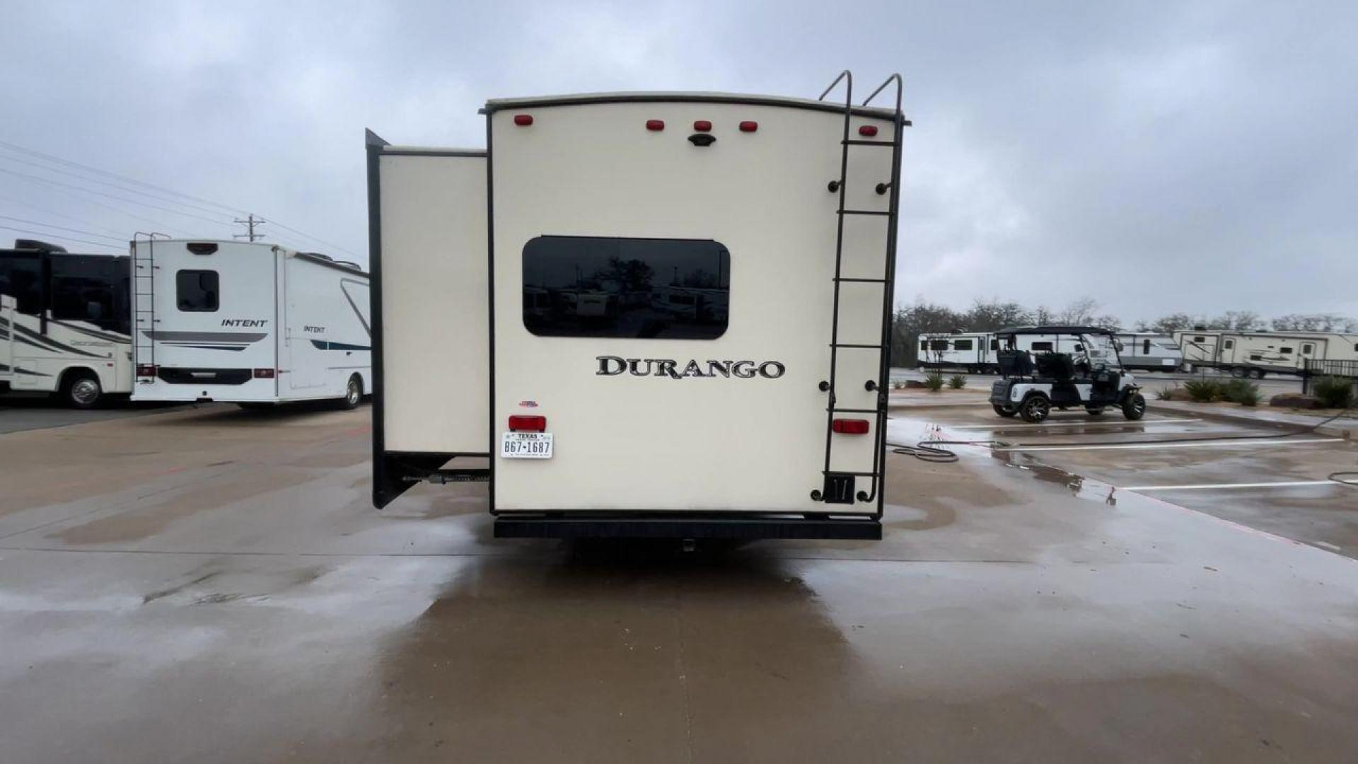 2019 KZ DURANGO GOLD 292BHT (4EZFD2925K6) , Length: 35 ft | Gross Weight: 11,500 lbs | Slides: 3 transmission, located at 4319 N Main Street, Cleburne, TX, 76033, (817) 221-0660, 32.435829, -97.384178 - At 35 ft. long, this 2019 KZ Durango 1500 292BHT fifth wheel RV showcases a striking two-tone cream and black color scheme accented with bold, swooping graphics in shades of gray and burgundy. The front cap features a sleek, aerodynamic design with the "Durango 1500" branding and mountain graphic. A - Photo#8