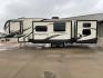 2019 KZ DURANGO GOLD 292BHT (4EZFD2925K6) , Length: 35 ft | Gross Weight: 11,500 lbs | Slides: 3 transmission, located at 4319 N Main Street, Cleburne, TX, 76033, (817) 221-0660, 32.435829, -97.384178 - At 35 ft. long, this 2019 KZ Durango 1500 292BHT fifth wheel RV showcases a striking two-tone cream and black color scheme accented with bold, swooping graphics in shades of gray and burgundy. The front cap features a sleek, aerodynamic design with the "Durango 1500" branding and mountain graphic. A - Photo#23