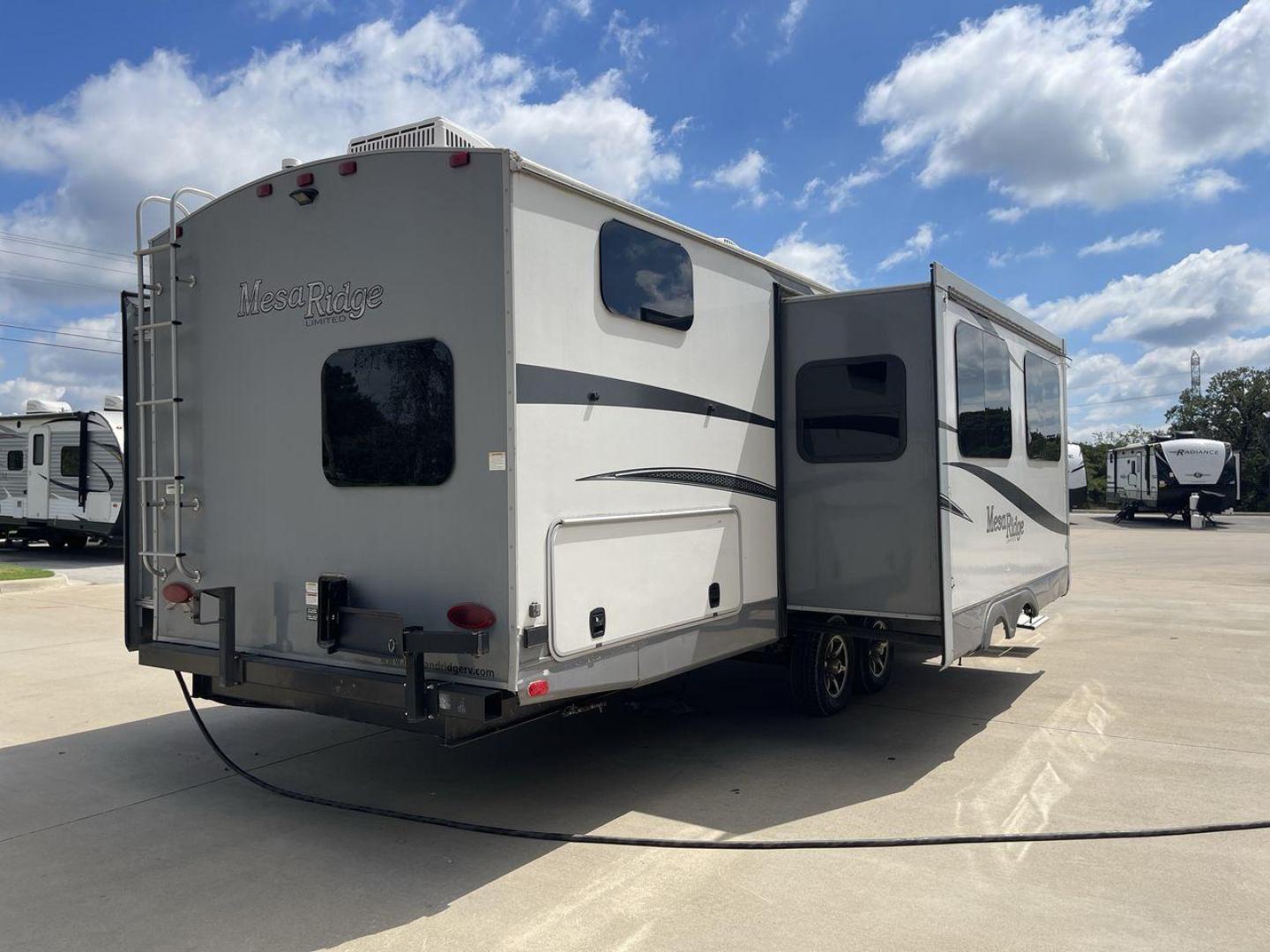 2019 GRAY OPEN RANGE MESA RIDGE (58TBH0BT1K3) , Length: 36.9 ft. | Dry Weight: 7,745 lbs. | Gross Weight: 9,735 lbs. | Slides: 3 transmission, located at 4319 N Main Street, Cleburne, TX, 76033, (817) 221-0660, 32.435829, -97.384178 - The 2019 Open Range Mesa Ridge 312BHS is a premium travel trailer that combines spaciousness, luxury, and practicality, making it ideal for families or groups looking for comfort on the road. This bunkhouse model has a large, open floor plan, providing separate living, sleeping, and outdoor areas. T - Photo#24