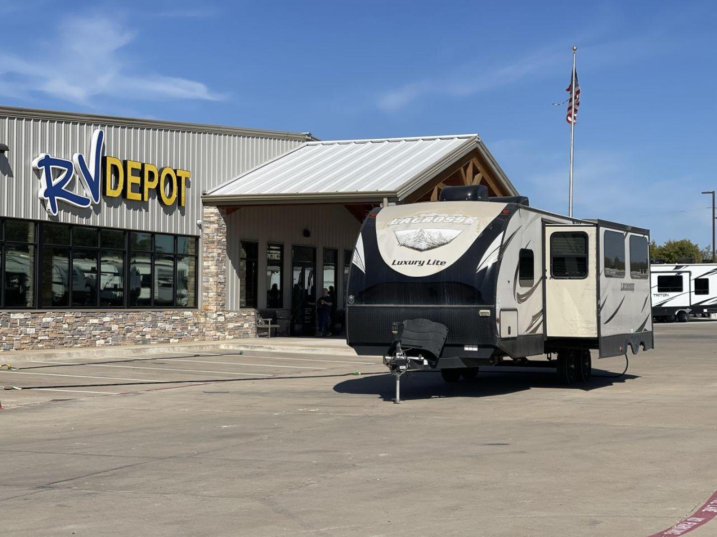 2019 TAN PRIME TIME LACROSSE 2911RB - (5ZT2LCUB3KB) , Length: 31.92 ft. | Dry Weight: 6,516 lbs. | Slides: 1 transmission, located at 4319 N Main Street, Cleburne, TX, 76033, (817) 221-0660, 32.435829, -97.384178 - This 2019 LaCrosse 2911RB travel trailer measures just a bit under 32' in length. It is a dual axle, aluminum wheel setup with a dry weight of 6,516 lbs and has a carrying capacity of 3,054 lbs. This LaCrosse has one slide. The rear of the trailer holds the bathroom, which has a standalone sink a - Photo#0