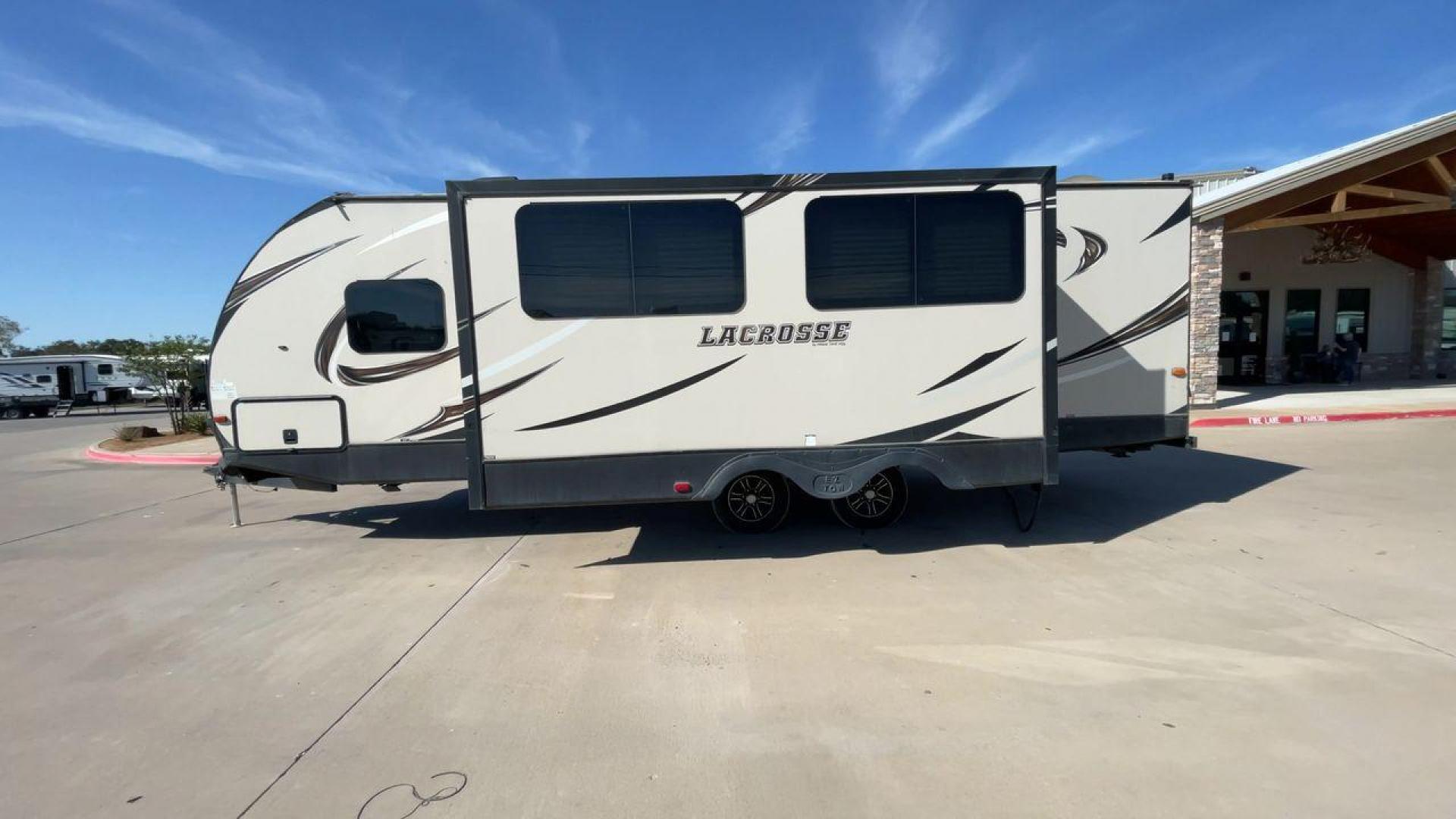 2019 TAN PRIME TIME LACROSSE 2911RB - (5ZT2LCUB3KB) , Length: 31.92 ft. | Dry Weight: 6,516 lbs. | Slides: 1 transmission, located at 4319 N Main Street, Cleburne, TX, 76033, (817) 221-0660, 32.435829, -97.384178 - This 2019 LaCrosse 2911RB travel trailer measures just a bit under 32' in length. It is a dual axle, aluminum wheel setup with a dry weight of 6,516 lbs and has a carrying capacity of 3,054 lbs. This LaCrosse has one slide. The rear of the trailer holds the bathroom, which has a standalone sink a - Photo#6