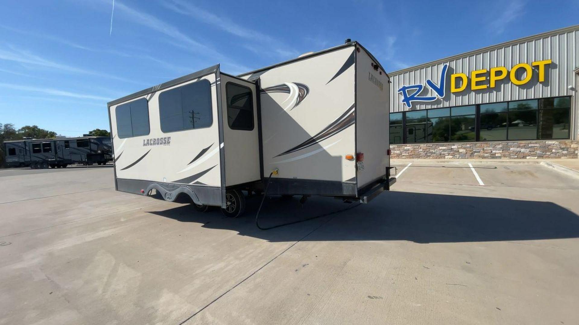 2019 TAN PRIME TIME LACROSSE 2911RB - (5ZT2LCUB3KB) , Length: 31.92 ft. | Dry Weight: 6,516 lbs. | Slides: 1 transmission, located at 4319 N Main Street, Cleburne, TX, 76033, (817) 221-0660, 32.435829, -97.384178 - This 2019 LaCrosse 2911RB travel trailer measures just a bit under 32' in length. It is a dual axle, aluminum wheel setup with a dry weight of 6,516 lbs and has a carrying capacity of 3,054 lbs. This LaCrosse has one slide. The rear of the trailer holds the bathroom, which has a standalone sink a - Photo#7