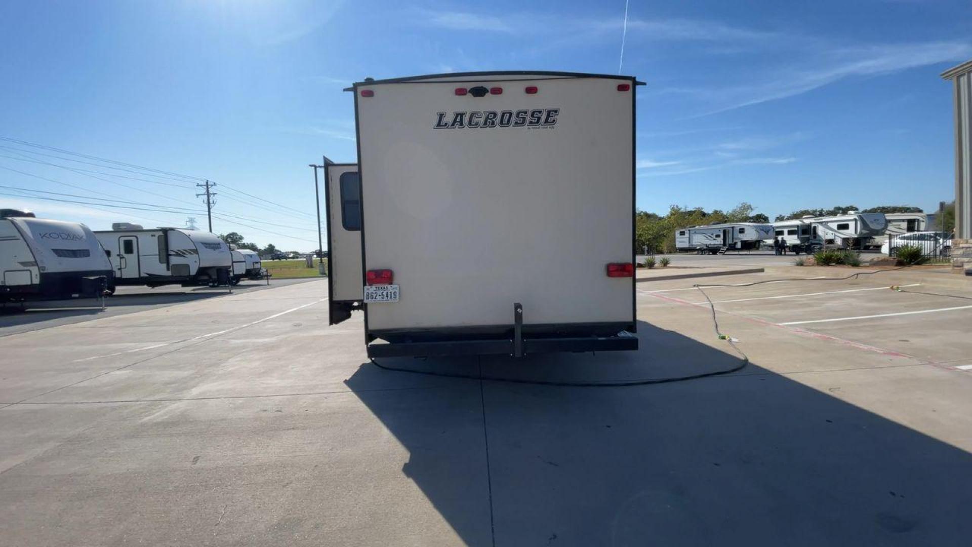 2019 TAN PRIME TIME LACROSSE 2911RB - (5ZT2LCUB3KB) , Length: 31.92 ft. | Dry Weight: 6,516 lbs. | Slides: 1 transmission, located at 4319 N Main Street, Cleburne, TX, 76033, (817) 221-0660, 32.435829, -97.384178 - This 2019 LaCrosse 2911RB travel trailer measures just a bit under 32' in length. It is a dual axle, aluminum wheel setup with a dry weight of 6,516 lbs and has a carrying capacity of 3,054 lbs. This LaCrosse has one slide. The rear of the trailer holds the bathroom, which has a standalone sink and - Photo#8