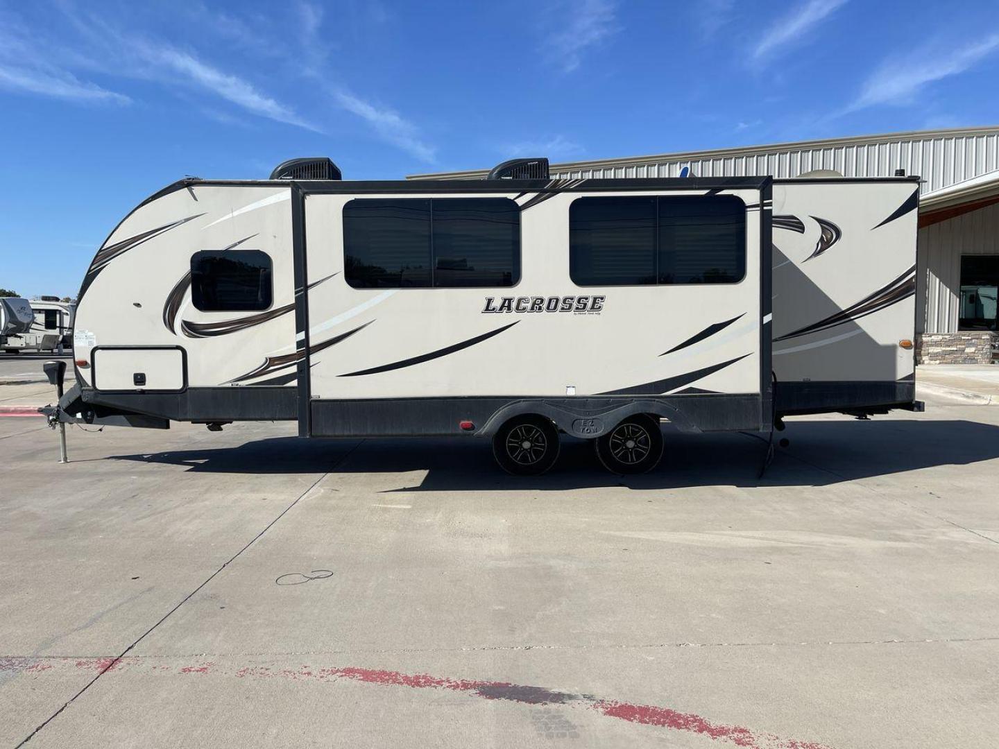 2019 TAN PRIME TIME LACROSSE 2911RB - (5ZT2LCUB3KB) , Length: 31.92 ft. | Dry Weight: 6,516 lbs. | Slides: 1 transmission, located at 4319 N Main Street, Cleburne, TX, 76033, (817) 221-0660, 32.435829, -97.384178 - This 2019 LaCrosse 2911RB travel trailer measures just a bit under 32' in length. It is a dual axle, aluminum wheel setup with a dry weight of 6,516 lbs and has a carrying capacity of 3,054 lbs. This LaCrosse has one slide. The rear of the trailer holds the bathroom, which has a standalone sink and - Photo#24