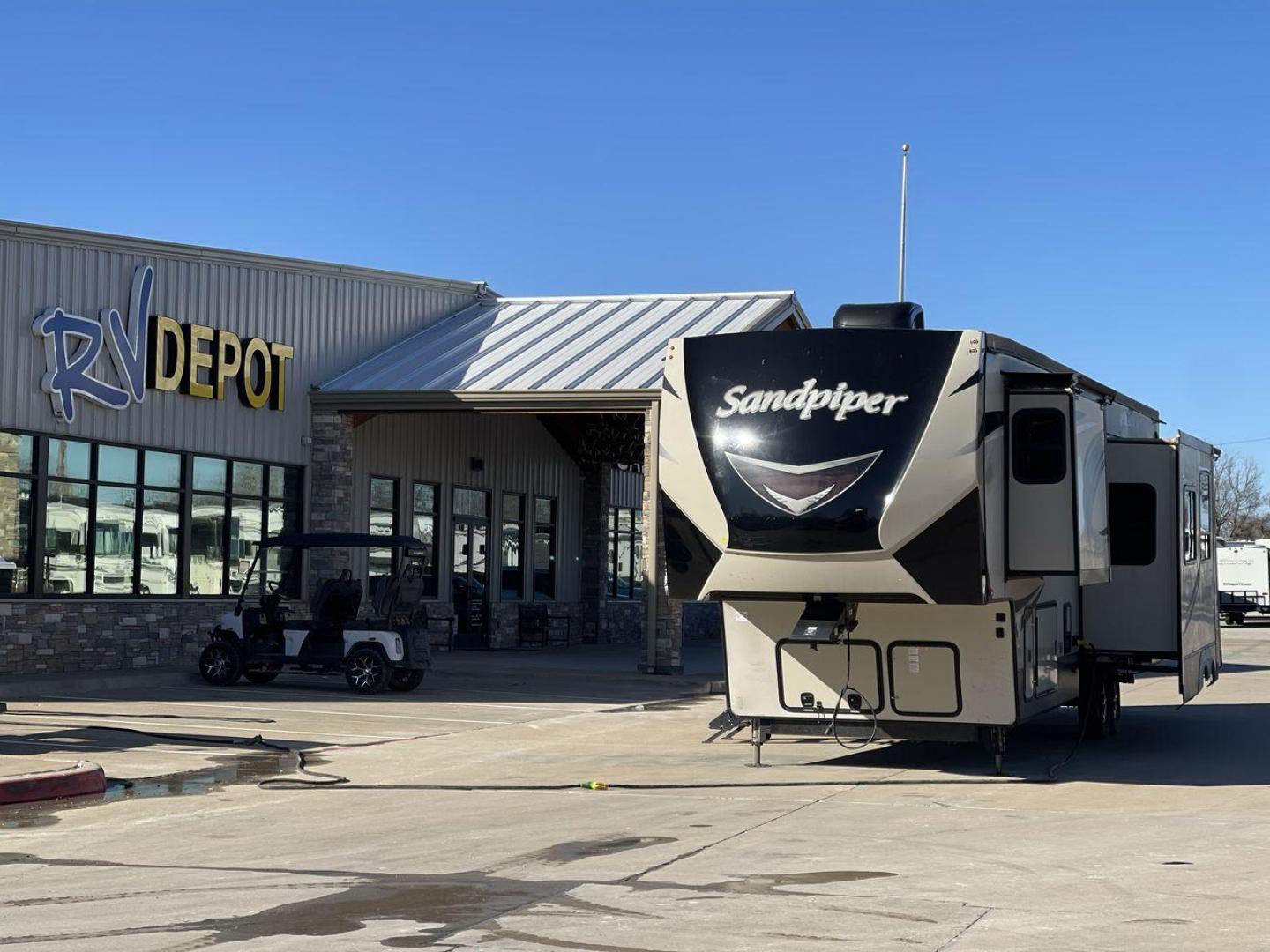 2019 TAN SANDPIPER 383RBLOK - (4X4FSAP2XKJ) , Length: 42.17 ft. | Dry Weight: 13,469 lbs. | Gross Weight: 15,500 lbs. | Slides: 4 transmission, located at 4319 N Main Street, Cleburne, TX, 76033, (817) 221-0660, 32.435829, -97.384178 - The 2019 Sandpiper 383RBLOK fifth wheel measures just a bit over 42 ft. in length. It has a dry weight of 13,469 lbs. and a GVWR of 15,500 lbs. It is made of aluminum and fiberglass. It also comes with automatic heating and cooling rated at 35,000 and 15,000 BTUs respectively. This Sandpiper is e - Photo#0