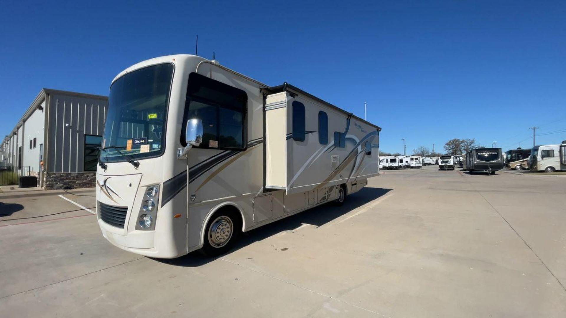 2019 THOR FREEDOM TRAVELER A30 (1F65F5DY1K0) , Length:31.75 ft. | Gross Weight: 18,000 lbs. | Slides: 1 transmission, located at 4319 N Main Street, Cleburne, TX, 76033, (817) 221-0660, 32.435829, -97.384178 - The 2019 Thor Freedom Traveler A30 is a sleek and modern travel trailer with an attractive beige exterior enhanced by dynamic swirls of gold, black, and white accents. Its single slide-out provides extra interior space when parked. The coach features large, tinted windows for ample natural light whi - Photo#5