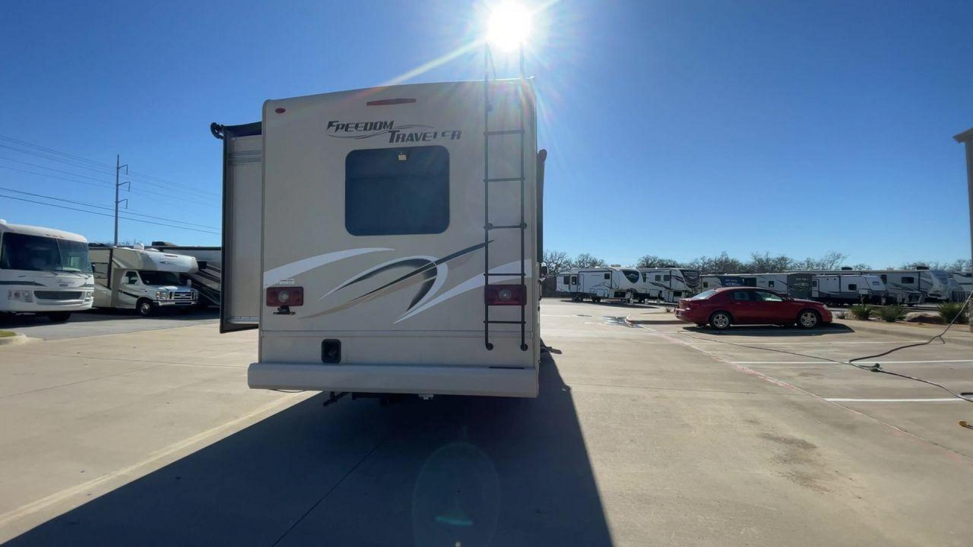 2019 THOR FREEDOM TRAVELER A30 (1F65F5DY1K0) , Length:31.75 ft. | Gross Weight: 18,000 lbs. | Slides: 1 transmission, located at 4319 N Main Street, Cleburne, TX, 76033, (817) 221-0660, 32.435829, -97.384178 - The 2019 Thor Freedom Traveler A30 is a sleek and modern travel trailer with an attractive beige exterior enhanced by dynamic swirls of gold, black, and white accents. Its single slide-out provides extra interior space when parked. The coach features large, tinted windows for ample natural light whi - Photo#8