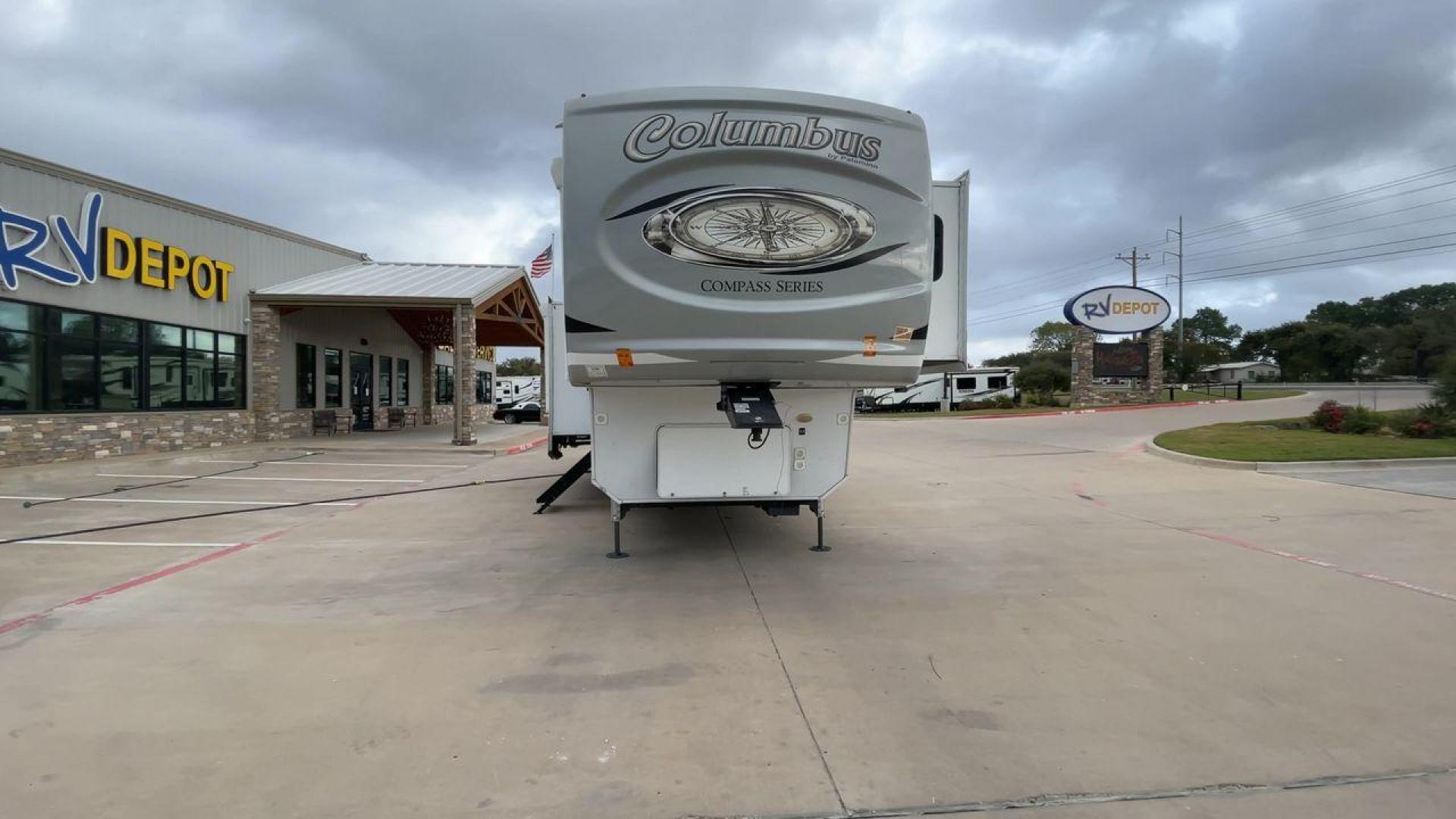 2020 FOREST RIVER COLUMBUS 374BHC (4X4FCMN20L6) , Length: 41.17 ft. | Dry Weight: 12,785 lbs. | Gross Weight: 15,785 lbs. | Slides: 4 transmission, located at 4319 N Main Street, Cleburne, TX, 76033, (817) 221-0660, 32.435829, -97.384178 - The 2020 Forest River Columbus 374BHC features a sleek and well-maintained exterior. Its body is painted in a neutral white shade with subtle brown and black accents, creating a stylish and timeless design. This unit includes multiple slideouts that expand the living space significantly when parked. - Photo#4